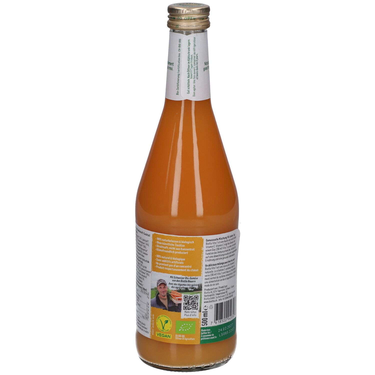 Dos de la bouteille en verre BIOTTA Vita 7. Étiquette avec texte, QR code et label BIO. Logo vegan. 500 ml.