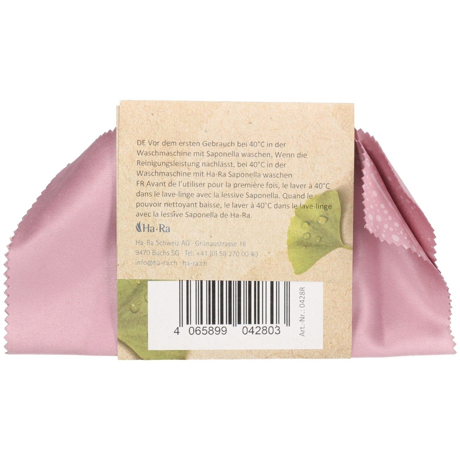 Chiffon rose pour lunettes avec étiquette. Sur l'étiquette: instructions de lavage, code-barres et logo. Réf. 042803.