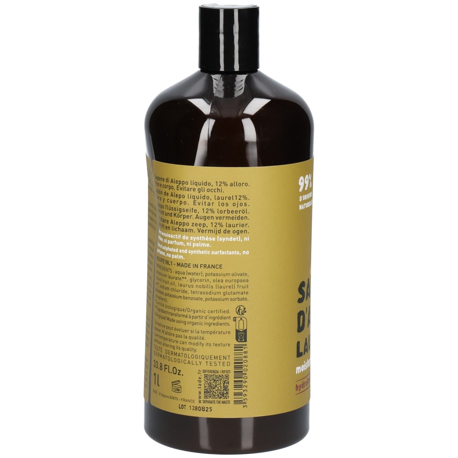 Arrière d'une bouteille foncée de savon liquide avec liste détaillée des ingrédients et fabrication.