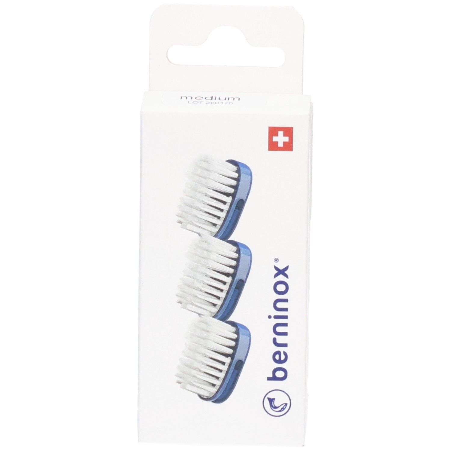 Emballage de 3 têtes de brosse à dents. Support bleu, poils blancs. Marque Berninox, croix suisse.