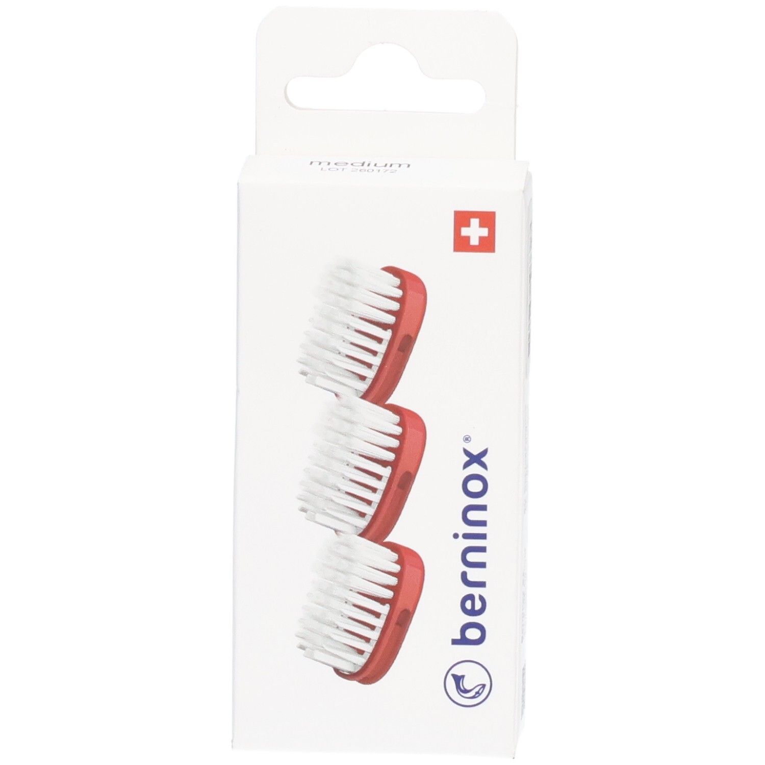 Trois têtes de brosse de remplacement, rouge corail, dans un emballage blanc avec croix suisse et logo.