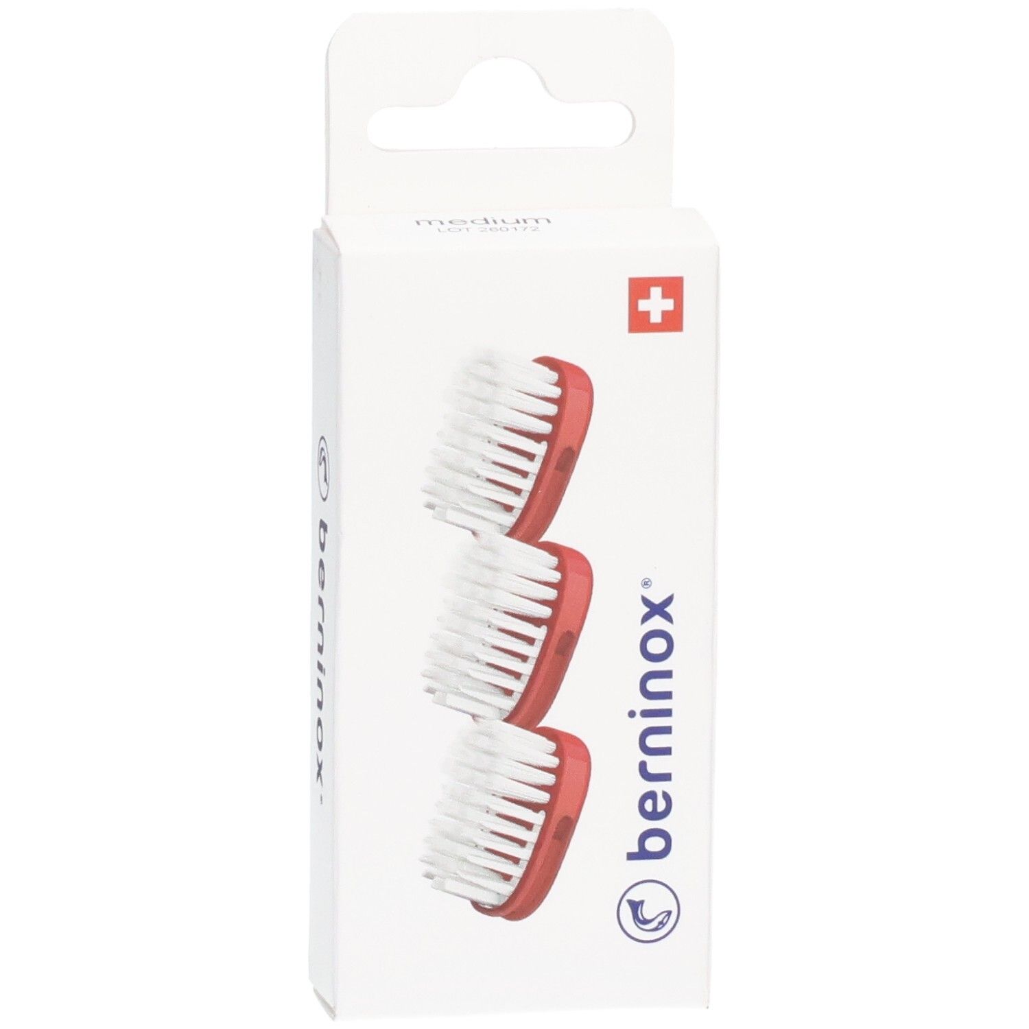 Trois têtes de brosse de remplacement, rouge corail, dans un emballage blanc avec croix suisse et logo.