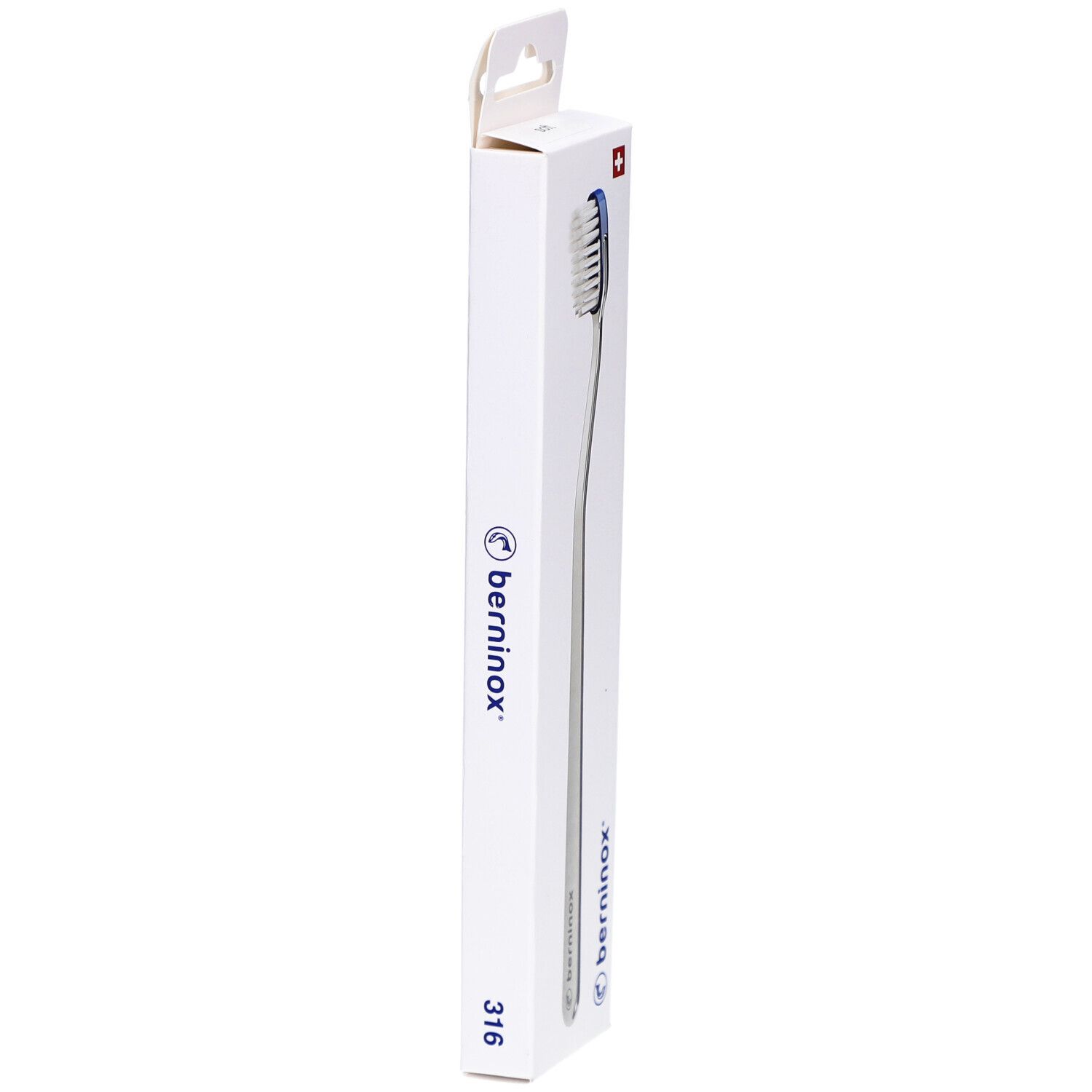 Emballage de brosse à dents. Blanc, avec logo, croix suisse et nom du produit. Forme élancée et allongée.