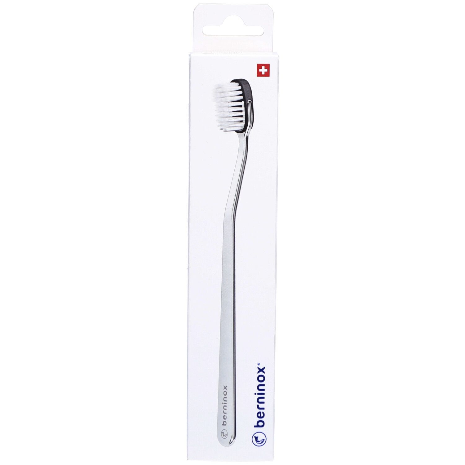 Brosse à dents dans son emballage. Tête noire, manche argenté. Croix suisse en haut. Marque Berninox.