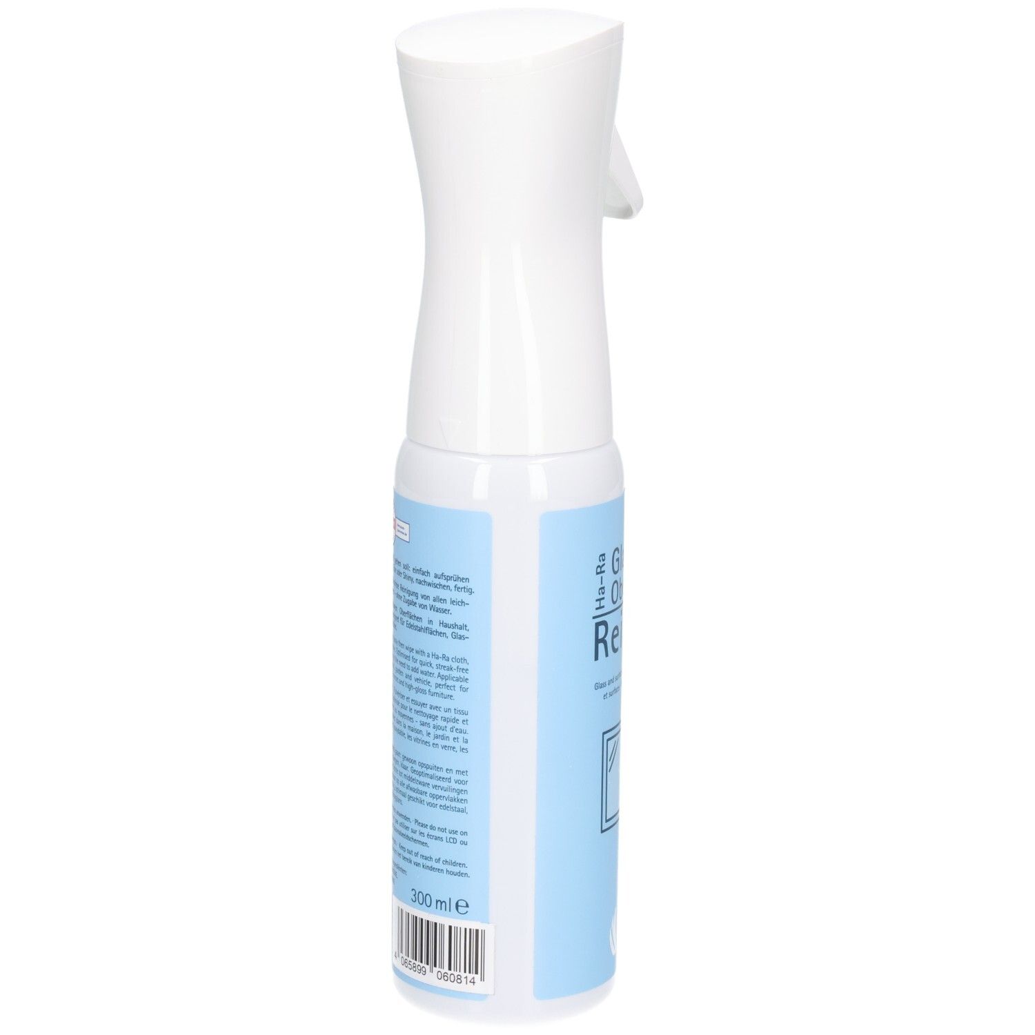 Flacon pulvérisateur blanc avec étiquette bleue. Texte et code-barres sur l'étiquette. Vue arrière.