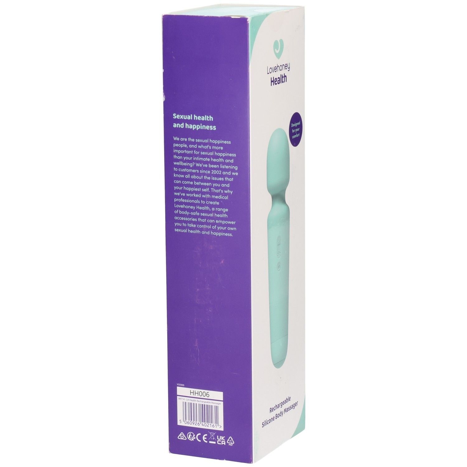 Emballage du masseur. Texte : Lovehoney Health. Texte : Rechargeable Silicone Body Massager. Texte sur la santé et le bonheur sur le côté.