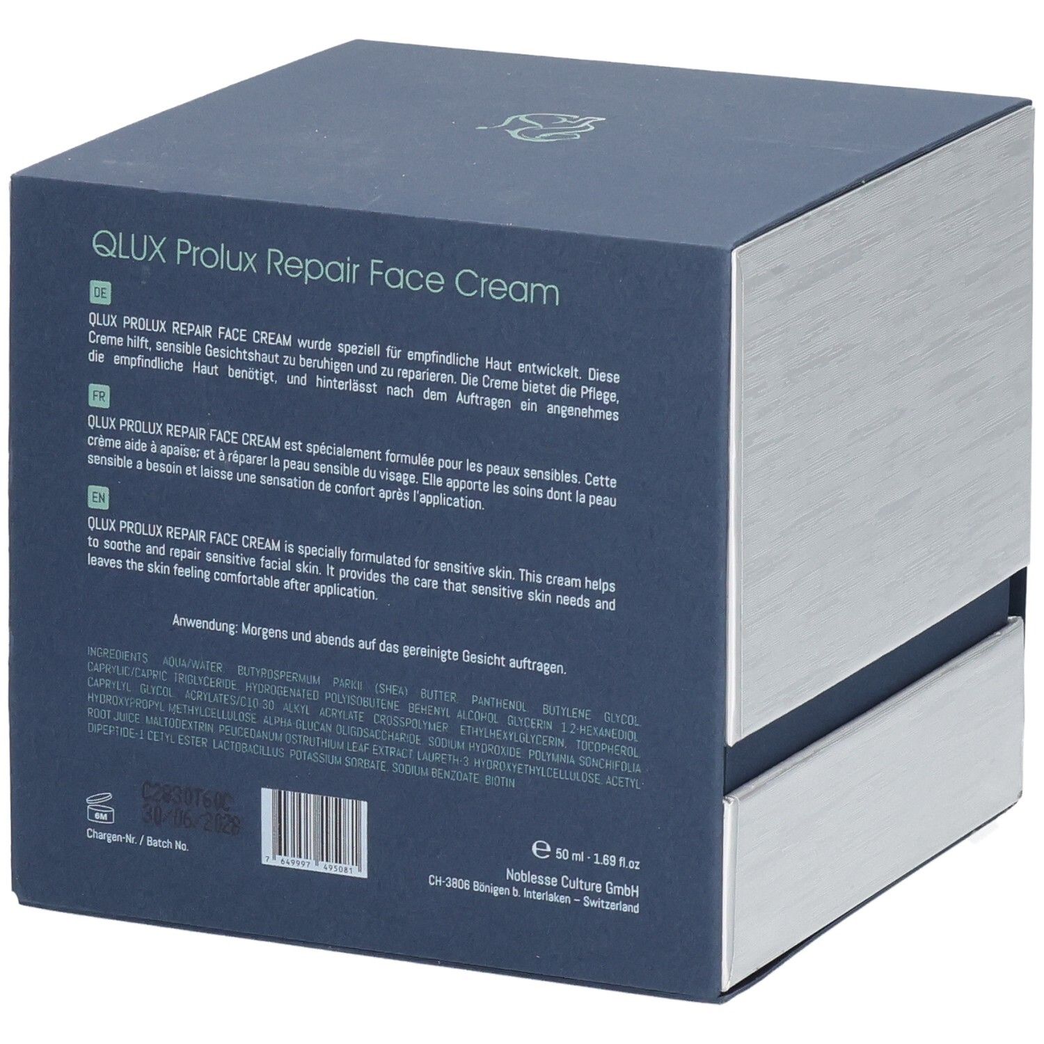 Dos de la boîte. Texte en allemand, français et anglais. Ingrédients. Croix suisse. QLUX Prolux Repair Face Cream.