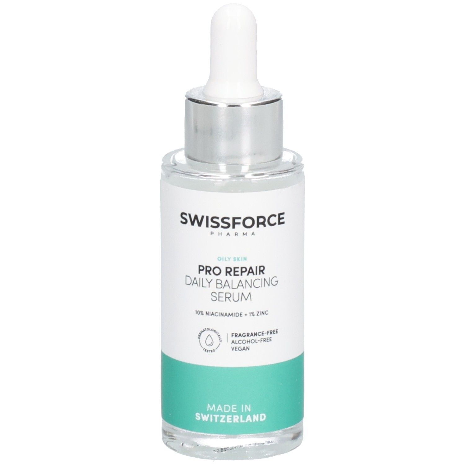 Flacon de sérum avec pipette. Inscription: SWISSFORCE Pharma, PRO REPAIR Daily Balancing Serum, 10% Niacinamide + 1% Zinc. Fabriqué en Suisse.