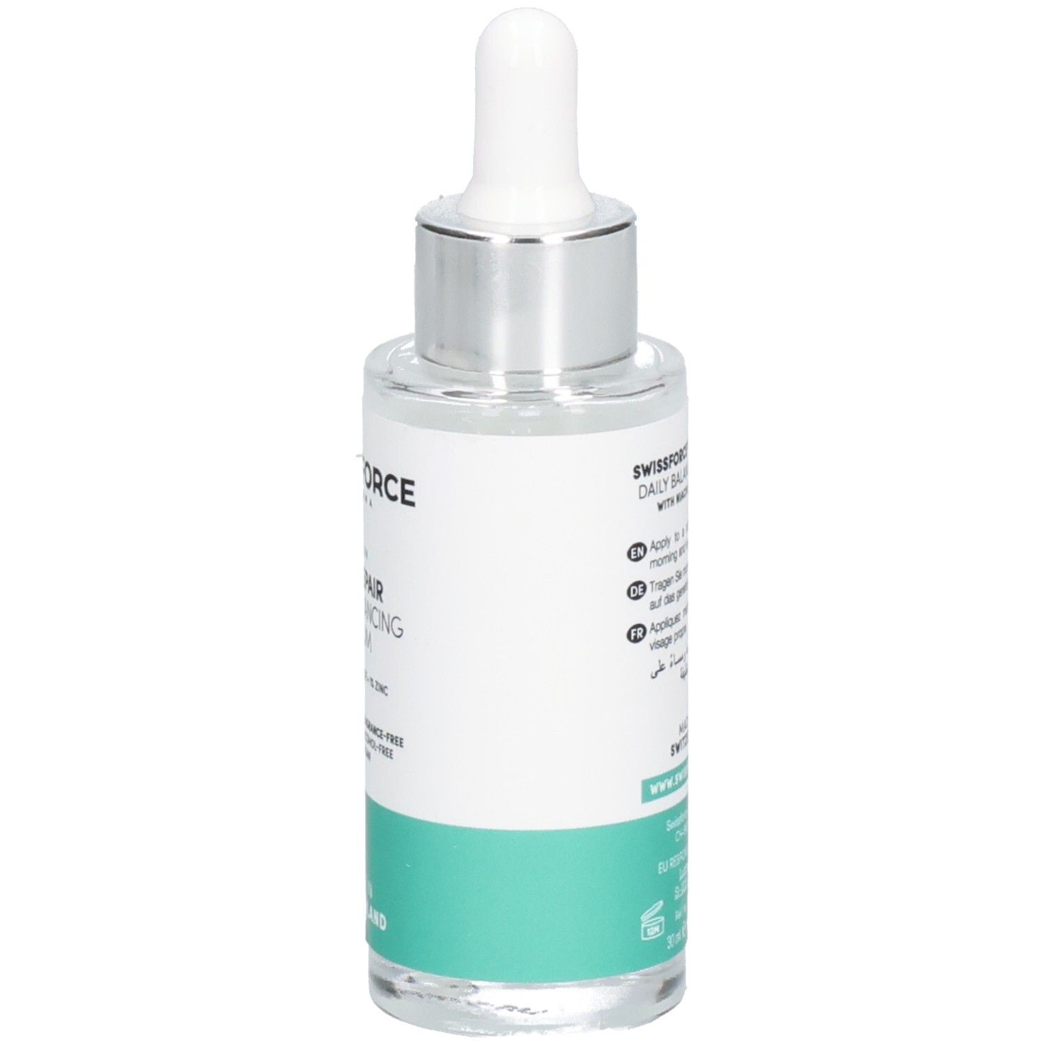 Vue arrière du flacon de sérum. Inscription: SWISSFORCE Pharma, PRO REPAIR Daily Balancing Serum. Fabriqué en Suisse. Avec mode d'emploi.