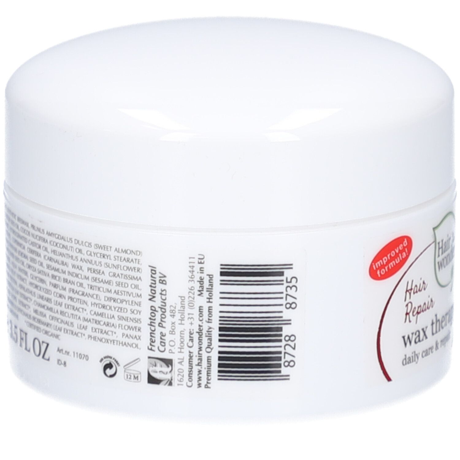 Pot blanc avec étiquette rouge. Inscription : Hairwonder Wax-thérapie. Contient 100 ml. Ingrédients et informations du fabricant sur le côté.