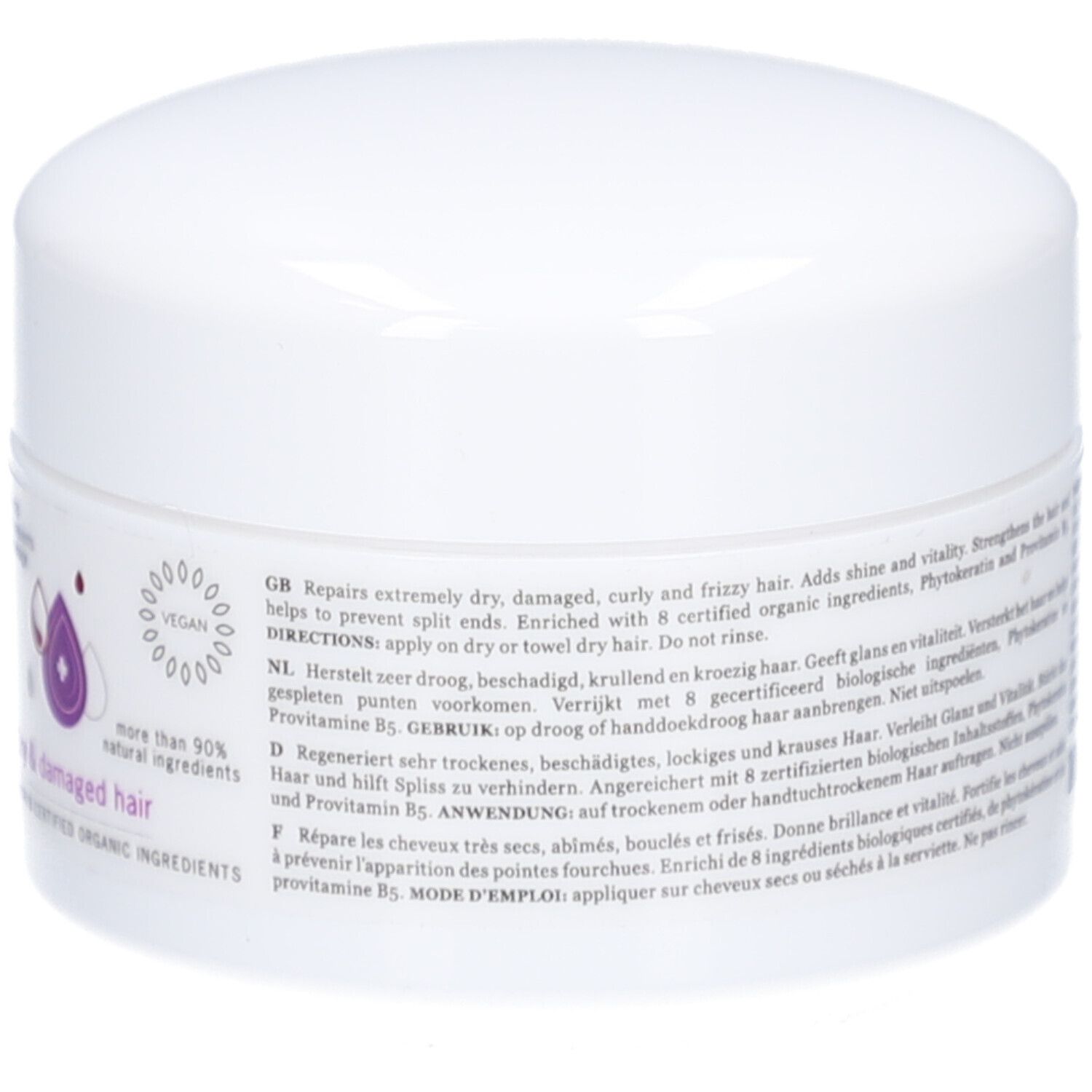 Pot blanc avec texte. Répare les cheveux secs, bouclés. Avec 8 ingrédients bio certifiés. Mode d'emploi : appliquer sur cheveux secs ou essorés.