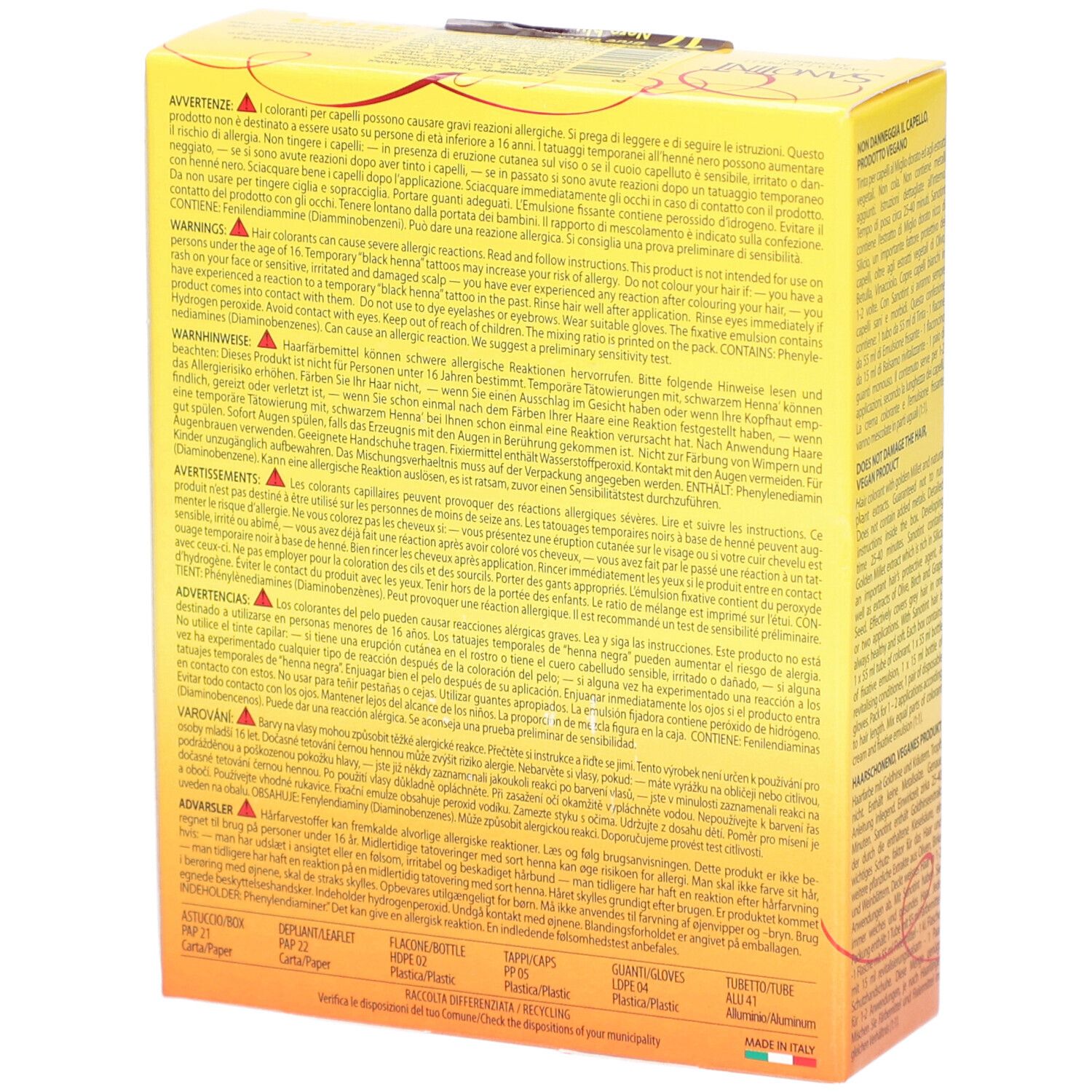 Boîte jaune avec texte multilingue. Avertissements et ingrédients. Fabriqué en Italie.
