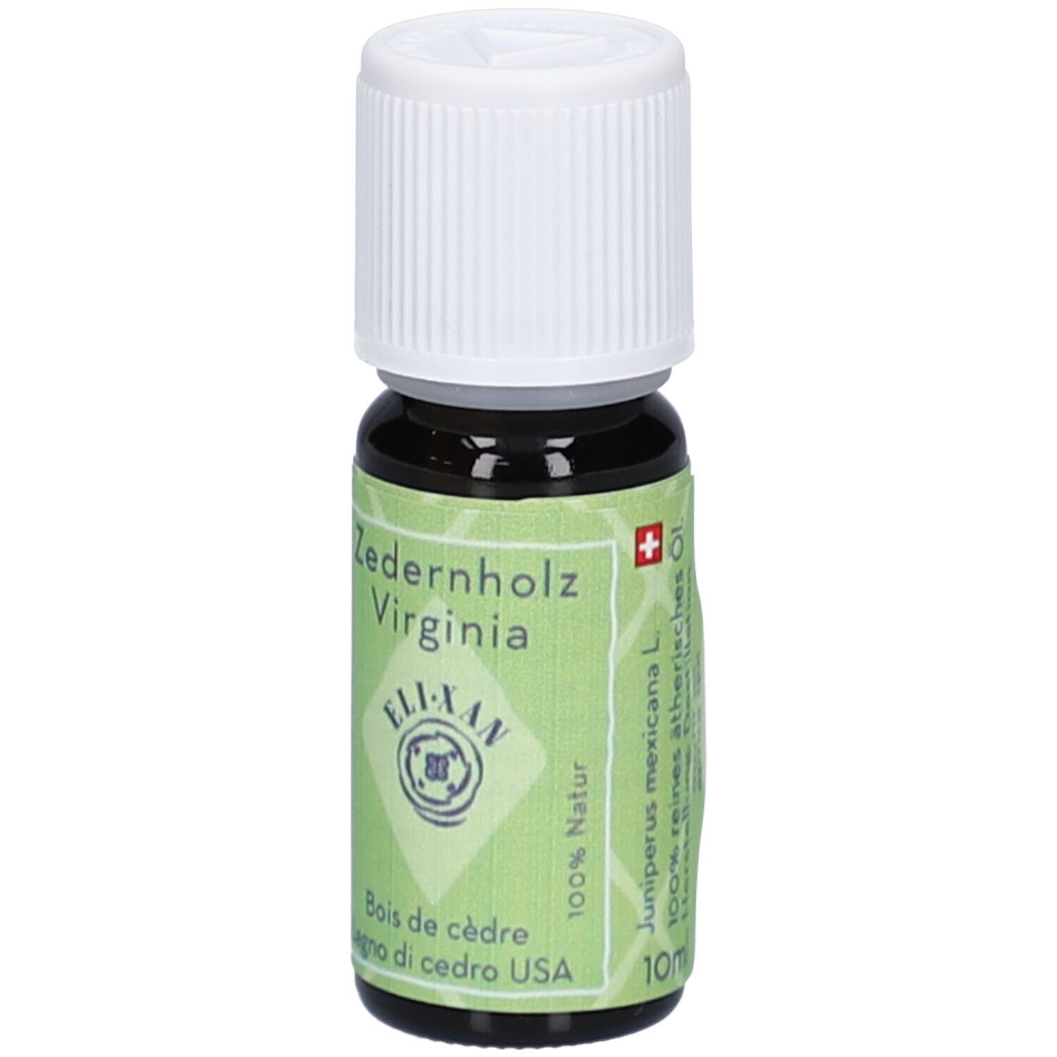 Flacon en verre brun foncé avec bouchon à vis blanc. Étiquette verte avec texte 'Bois de cèdre Virginia' et 'ELI-XAN'. Contient 10ml.