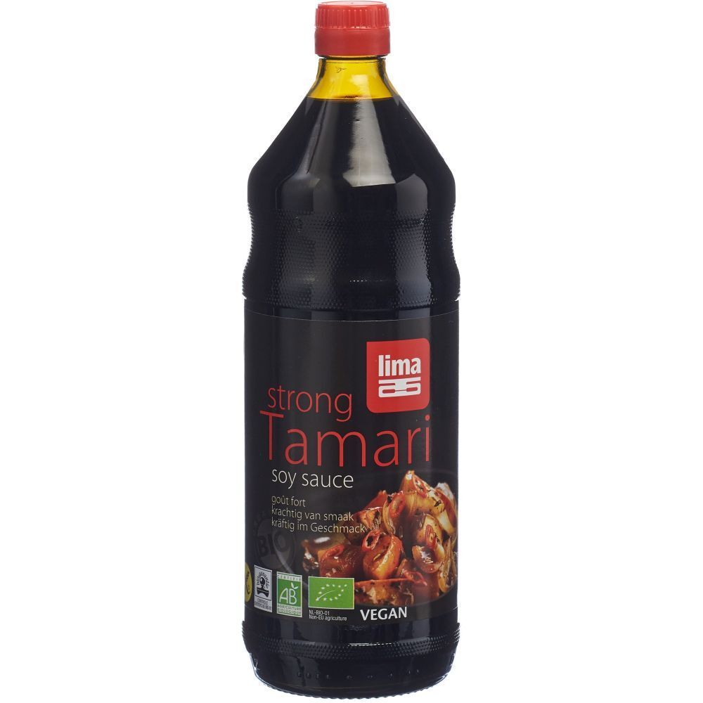 Sauce soja Tamari forte LIMA en bouteille en verre avec bouchon rouge. Liquide foncé avec étiquette.