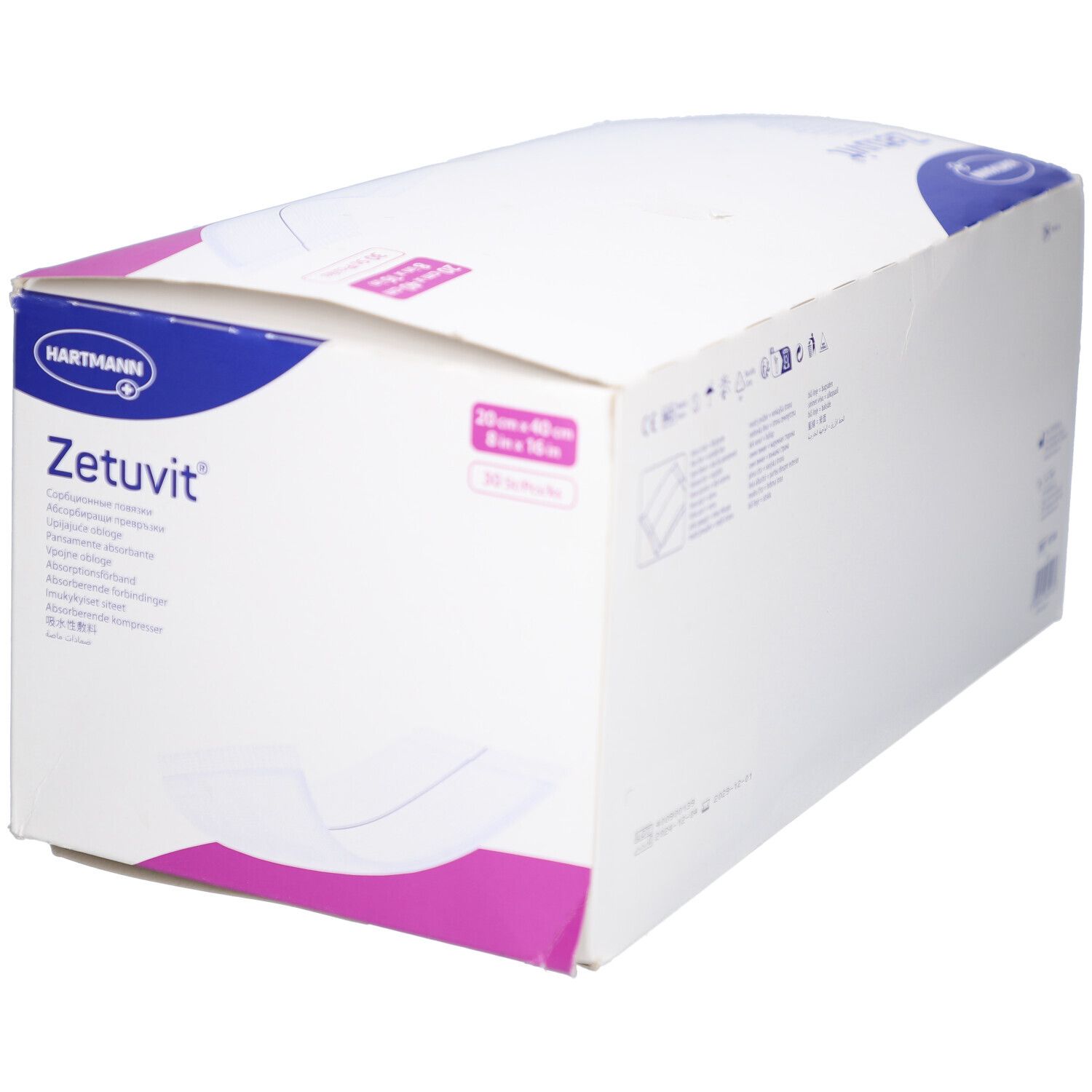 Emballage blanc "Zetuvit" avec logo, illustration du produit et dimensions 20x40 cm. Logo Hartmann.