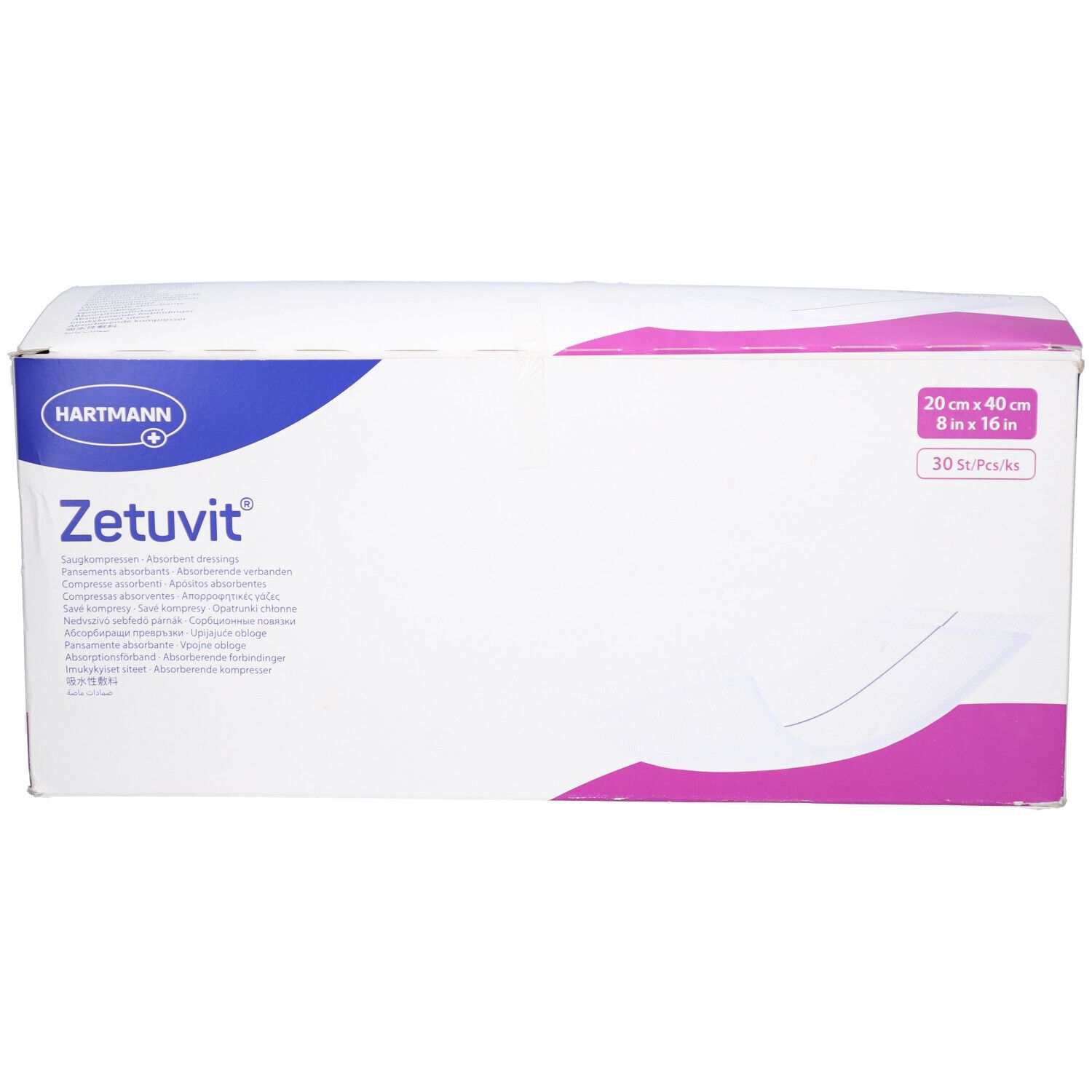 Emballage blanc "Zetuvit" avec logo, illustration du produit et dimensions 20x40 cm. Logo Hartmann.