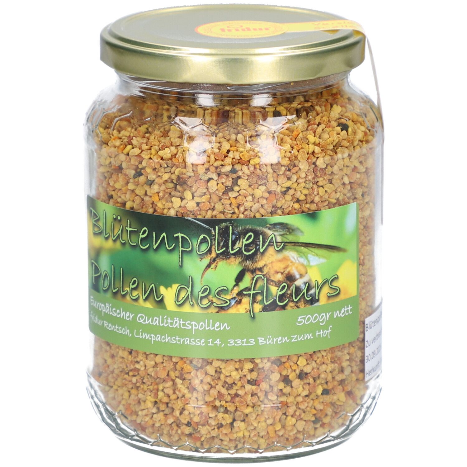 Pot de pollen de fleurs en verre. Étiquette avec nom et logo du produit. Couvercle jaune. Contenu visible.