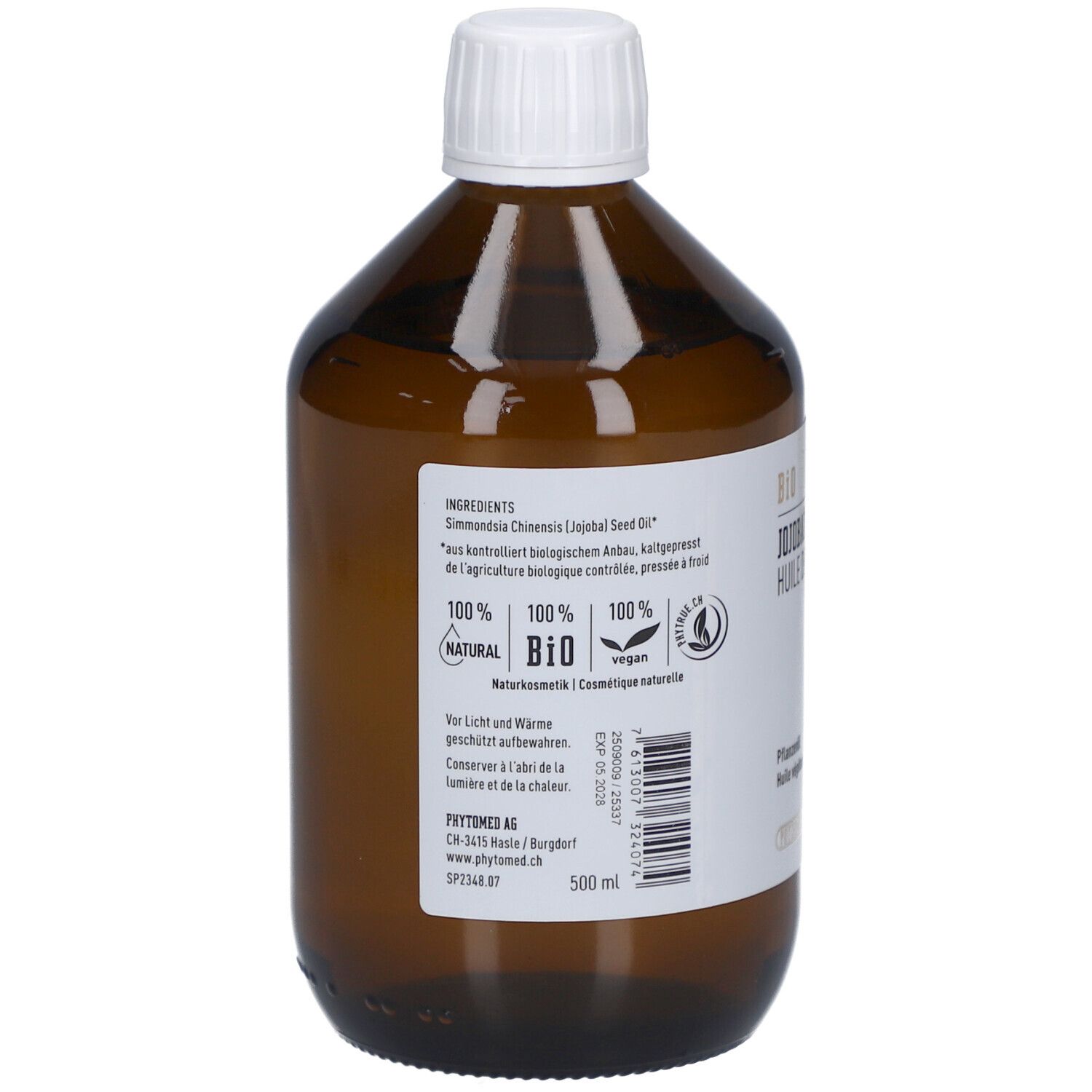 Flacon en verre brun avec bouchon blanc. Étiquette avec ingrédients, 100% naturel, BIO, végétalien. Adresse du fabricant et numéro de lot.