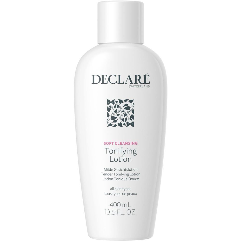 Flacon blanc avec bouchon. Inscription : DECLARÉ SWITZERLAND, logo, Soft Cleansing, Toning Lotion. Texte en allemand, français, italien, néerlandais. 400 ml.
