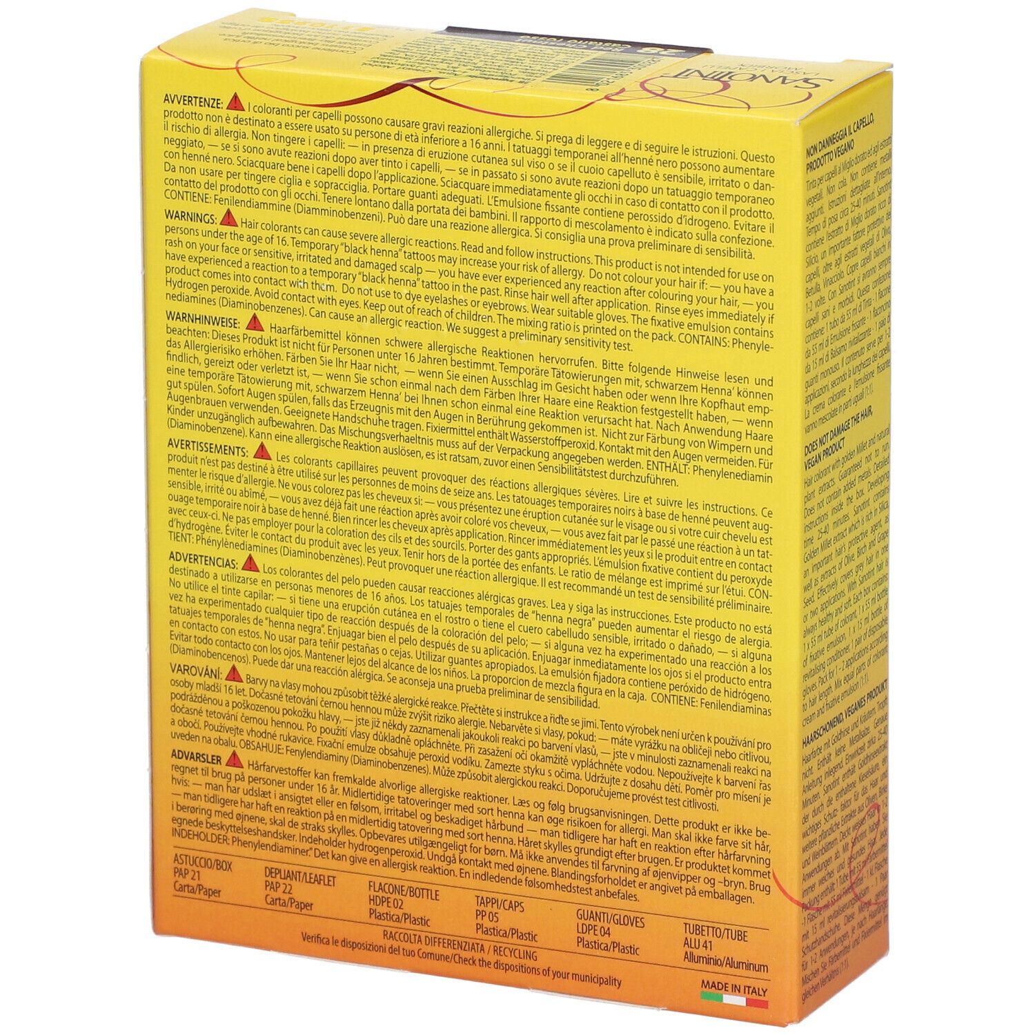 Dos d'une boîte jaune. Texte multilingue. Contient des avertissements et des ingrédients. Fabriqué en Italie.