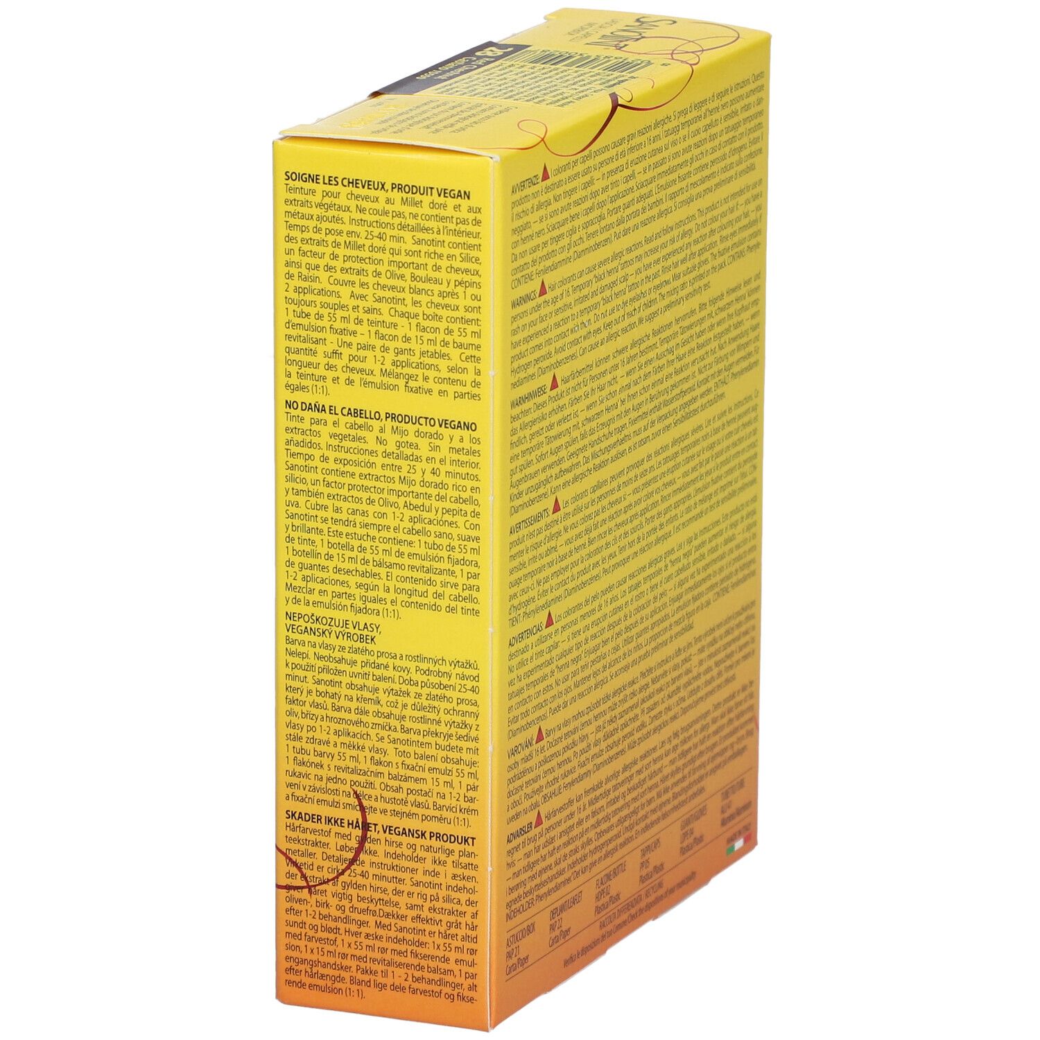 Côté d'une boîte jaune. Texte multilingue. Produit végétalien. Contient des instructions. Fabriqué en Italie.