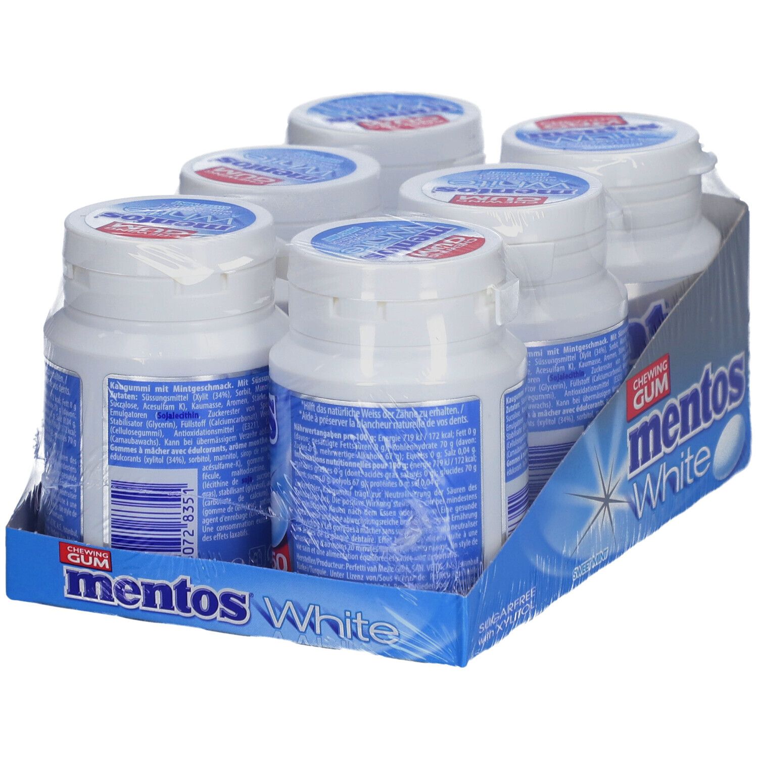 Six bouteilles de chewing-gum Mentos White dans un emballage. Inscription : Mentos White, sans sucre avec du xylitol. Menthe douce.