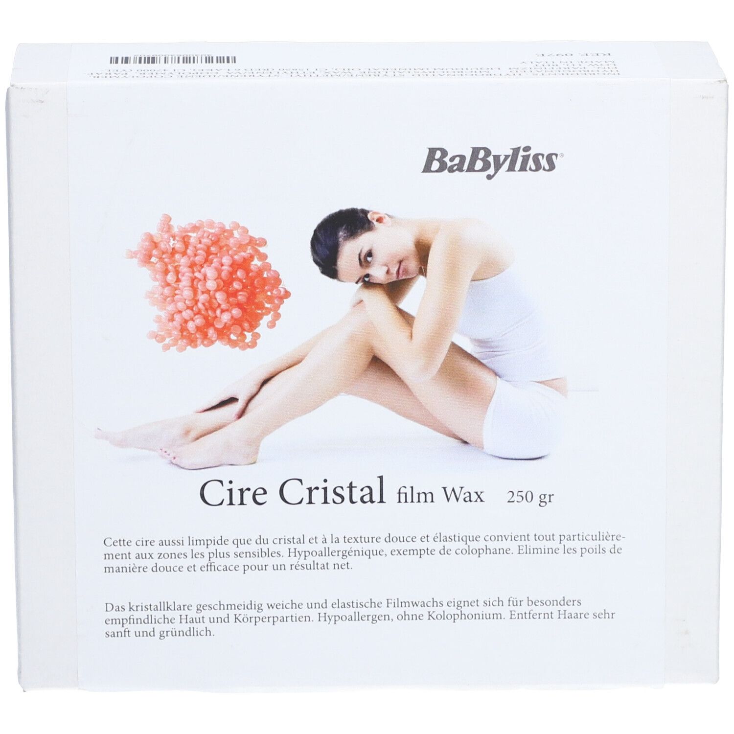 Boîte blanche avec image et texte. Marque BaByliss. Nom du produit : Cire Cristal film Wax. 250 gr.