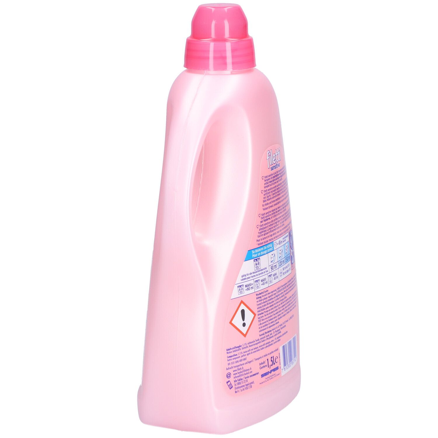 Bouteille rose avec poignée et bouchon doseur. Vue latérale. Inscription : Filetti sensitive.