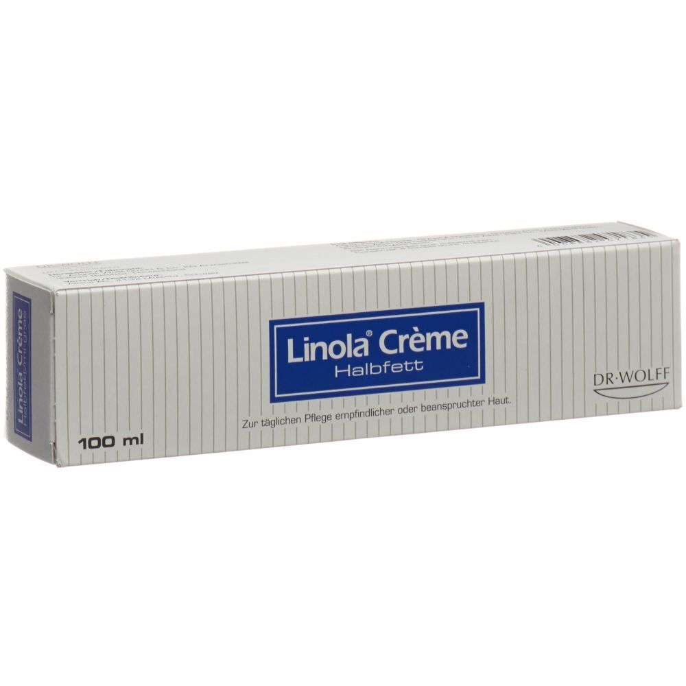Boîte de Linola Crème halbfett. Texte bleu sur fond blanc. 100 ml. Dr. Wolff.
