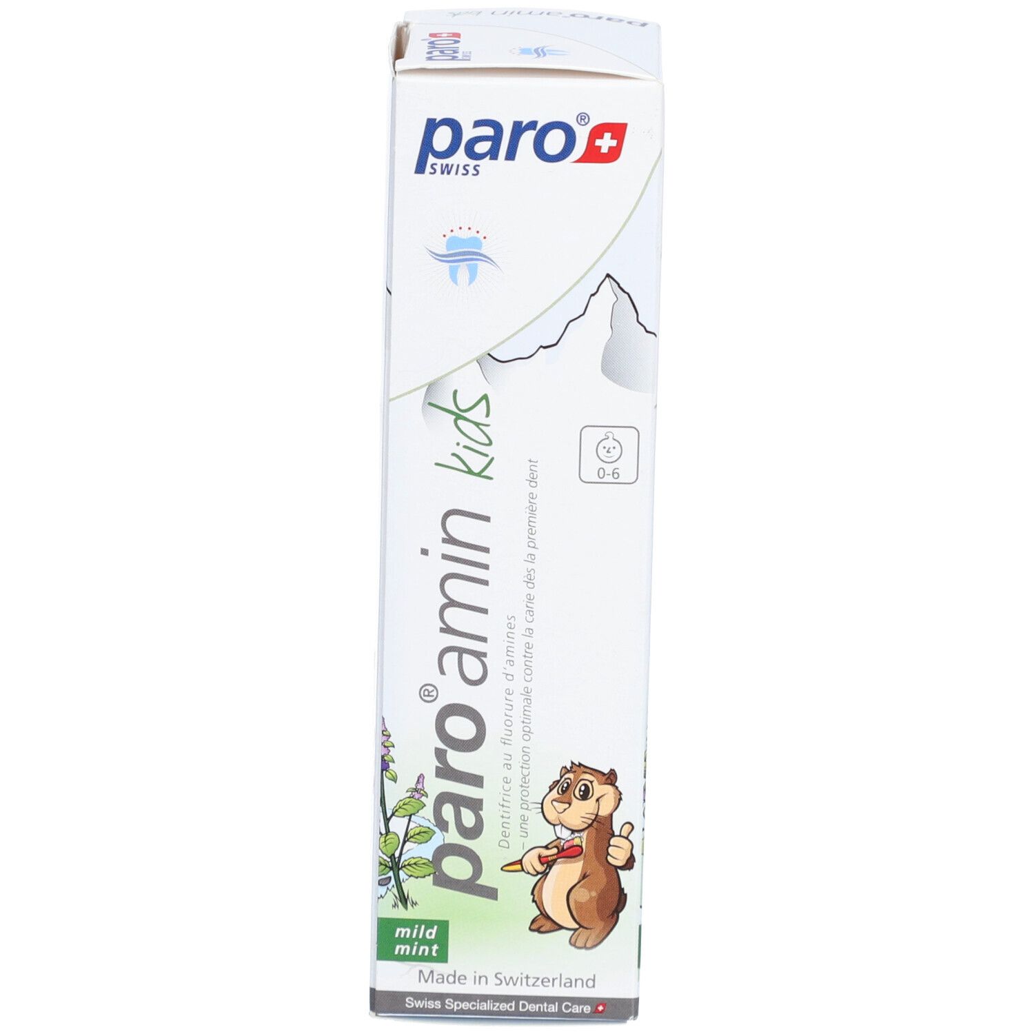 Boîte de dentifrice. Logo et nom du produit. Illustration d'un écureuil. Texte : Amin Kinder Zahnpasta Menthe 0-6 Jahre. Fabriqué en Suisse.