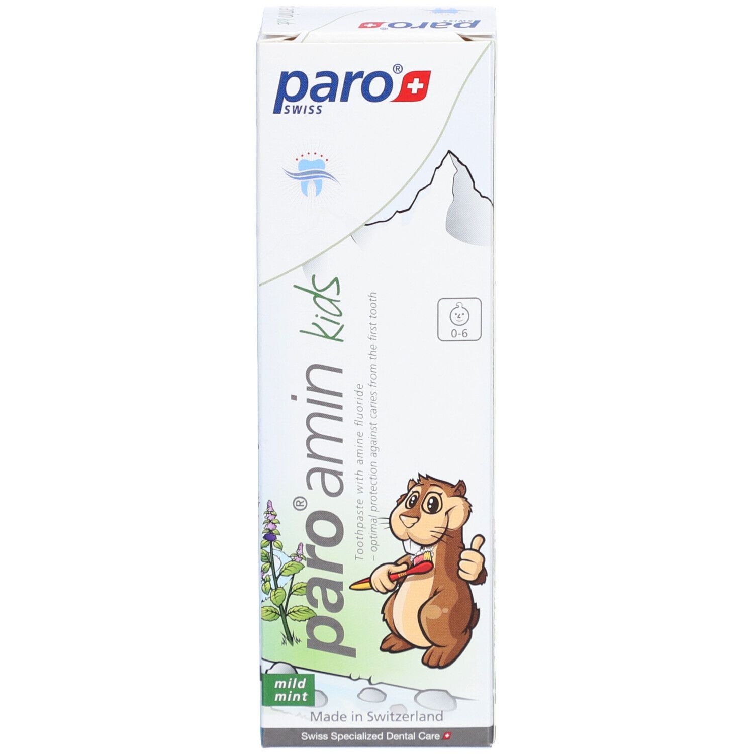 Boîte de dentifrice. Logo et nom du produit. Illustration d'un écureuil. Texte : Amin Kinder Zahnpasta Menthe 0-6 Jahre. Fabriqué en Suisse.
