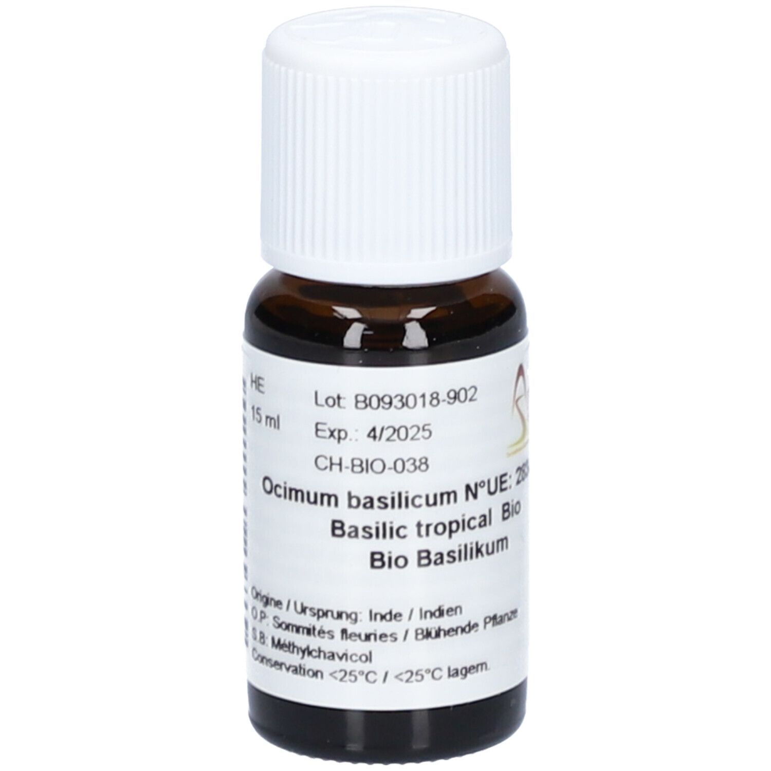 Flacon en verre brun avec bouchon blanc. Étiquette avec texte: Ocimum basilicum, Basilic tropical Bio. Numéro de lot et date d'expiration. 15 ml.