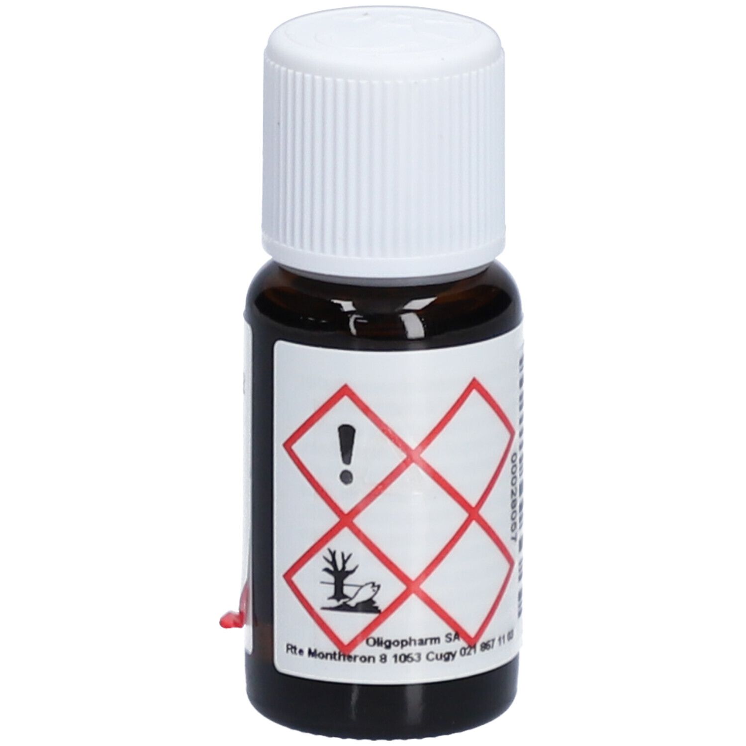Flacon en verre brun avec bouchon blanc. Étiquette avec symboles de danger. Adresse Oligopharm.