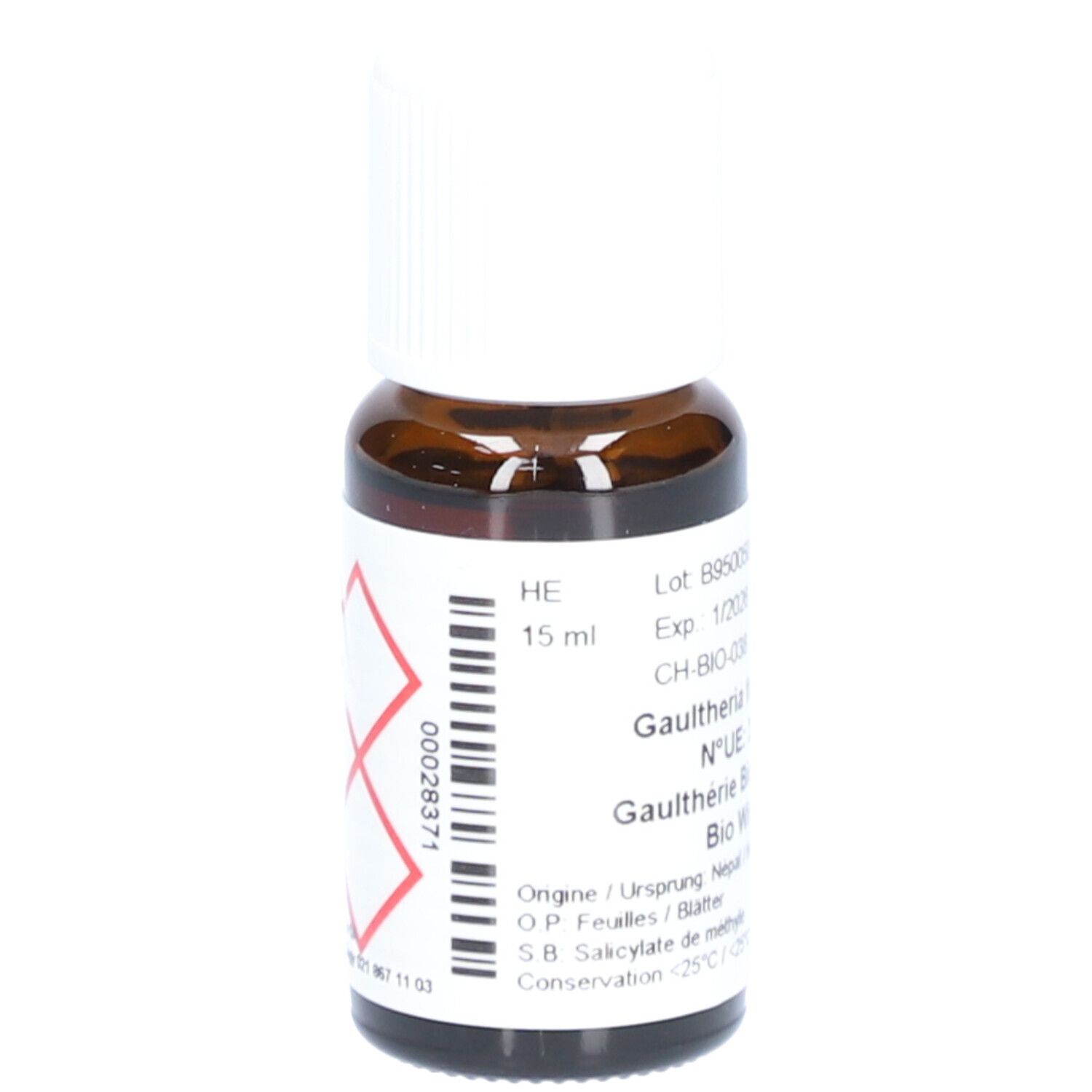 Flacon en verre brun avec bouchon blanc. Étiquette avec texte et symbole de danger. Inscription: Gautheria, 15 ml.