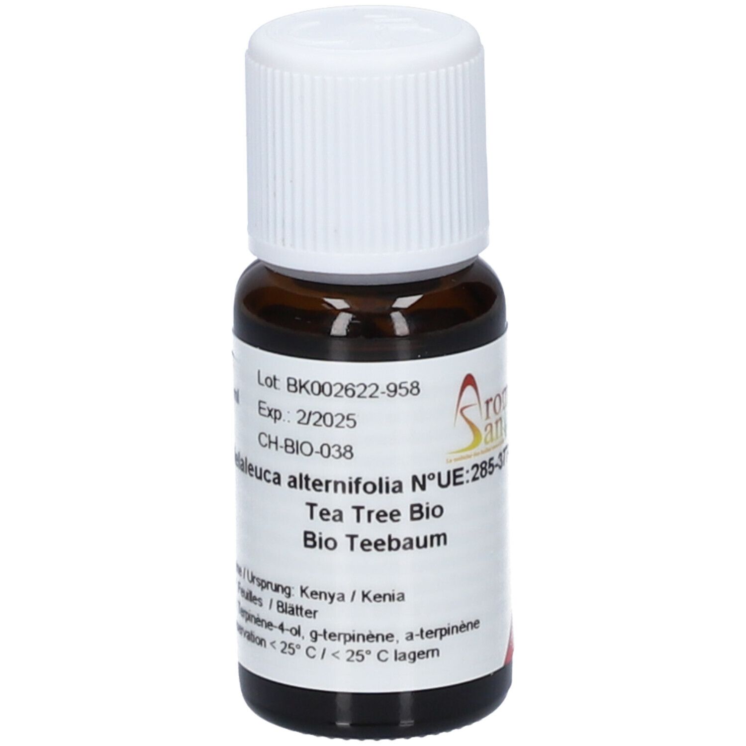Flacon en verre brun avec bouchon blanc. Étiquette avec texte: Melaleuca alternifolia, Tea Tree Bio, Bio Teebaum. DDM 2/2025.