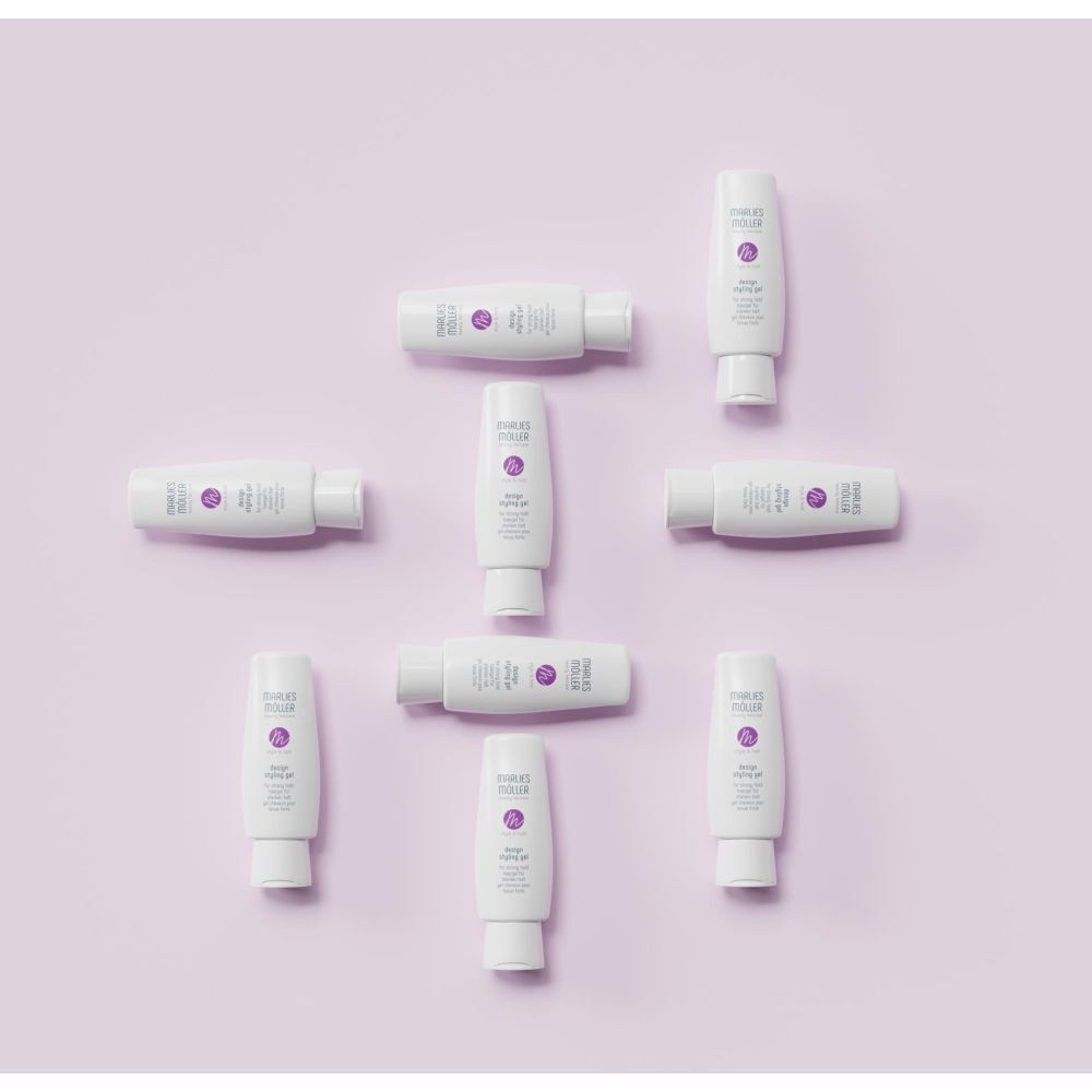 Plusieurs tubes de Marlies Möller Design Styling Gel sur fond lilas.