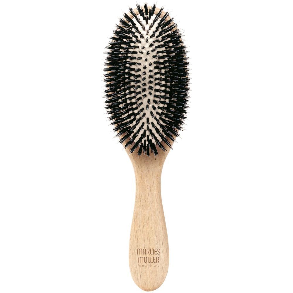 Brosse à cheveux ovale, manche en bois, soies noires. Logo de la marque sur le manche.