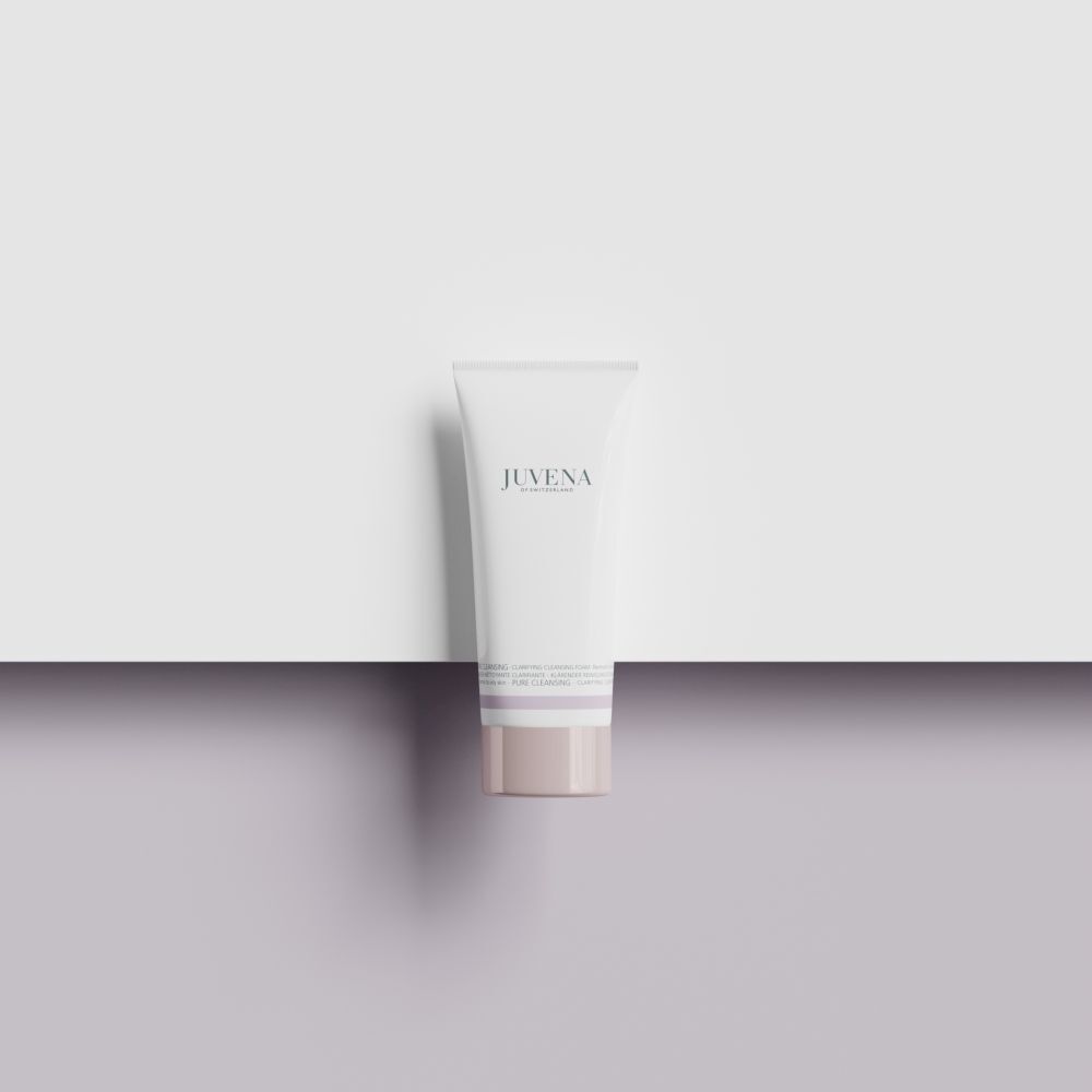 Tube blanc avec nom de produit et marque. Bouchon gris. Sur fond blanc et violet.