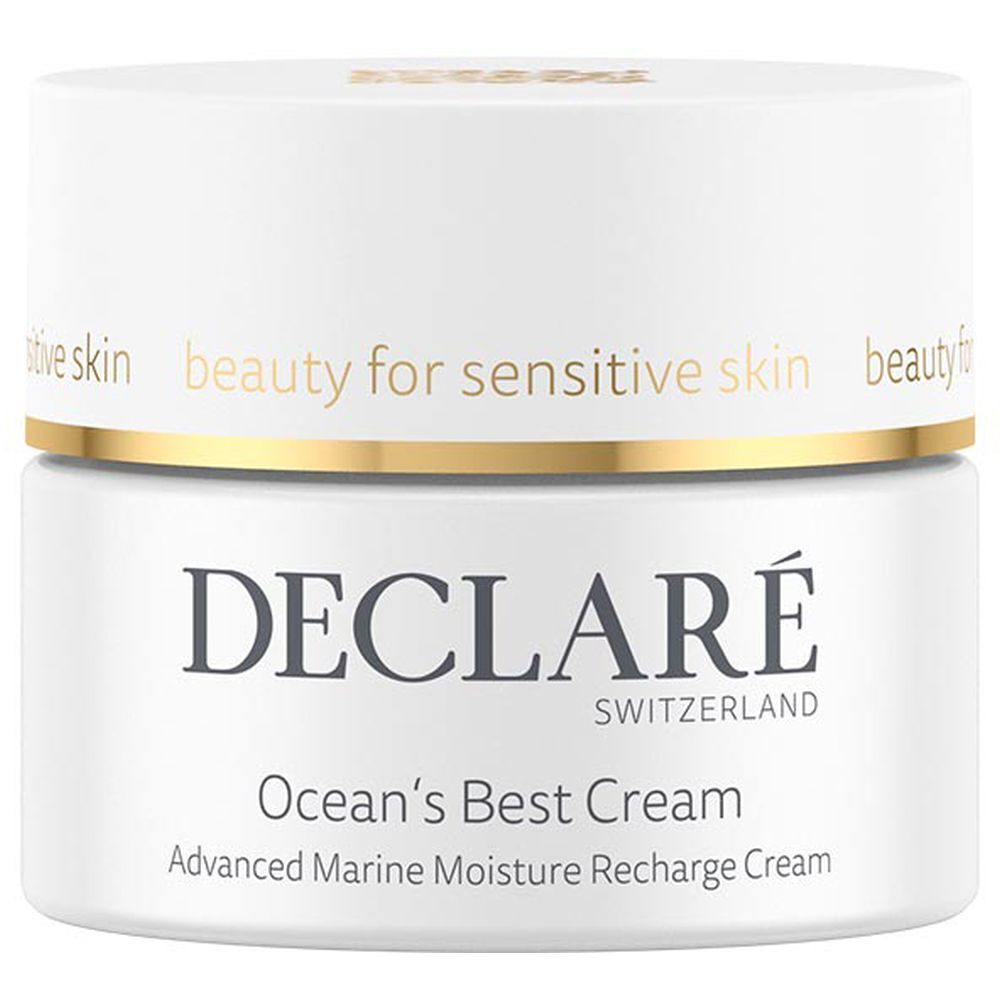 Pot blanc avec bord doré. DECLARÉ Ocean's Best Cream. Texte: beauty for sensitive skin.