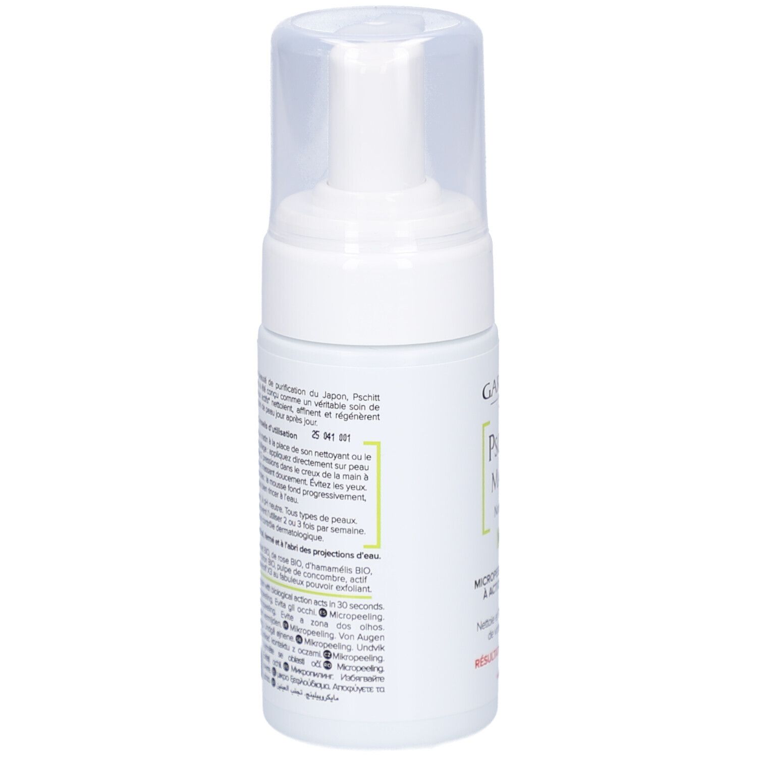 Flacon blanc avec pompe. Inscription: GARANCIA, Pschitt Magique, Nouvelle Peau, Visage. Texte en français.