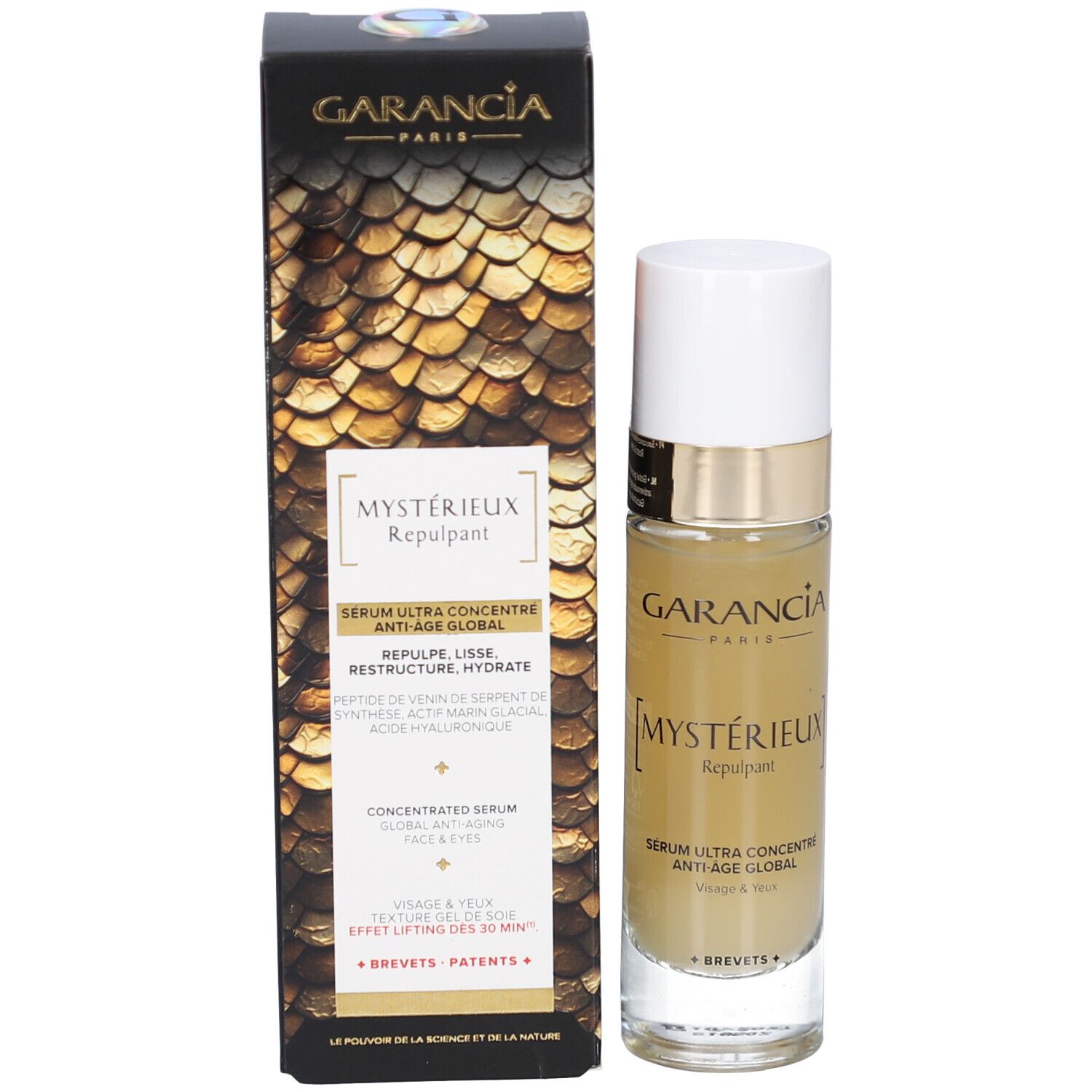 Produit avec emballage. Inscription: GARANCIA, [MYSTÉRIEUX] Repulpant, Sérum Anti-Âge Global Visage & Yeux.