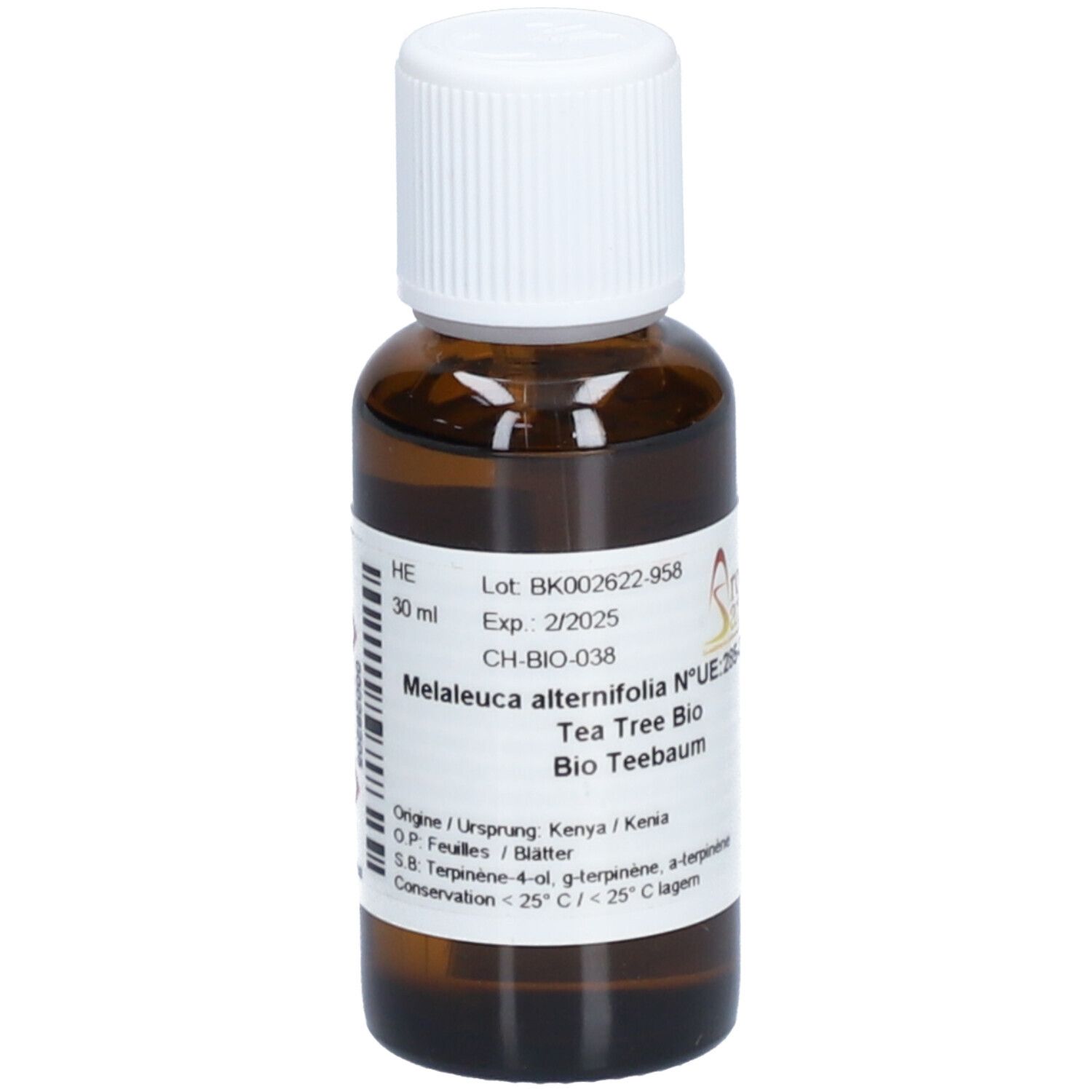 Flacon en verre brun avec bouchon blanc. Étiquette avec texte: Melaleuca alternifolia, Tea Tree Bio, Bio Teebaum. 30 ml.
