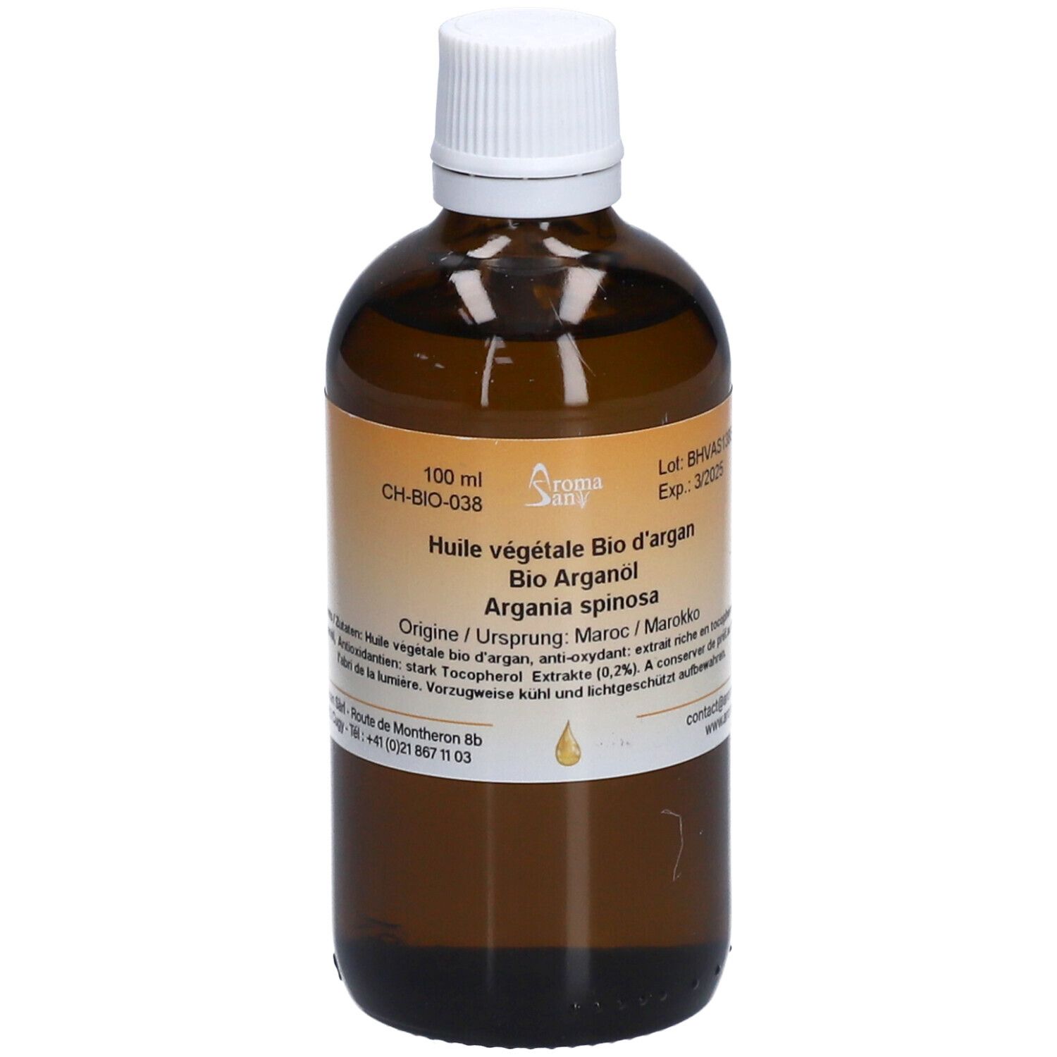 Flacon en verre brun avec bouchon blanc. Étiquette avec informations produit. Inscription: Huile végétale Bio d'argan.