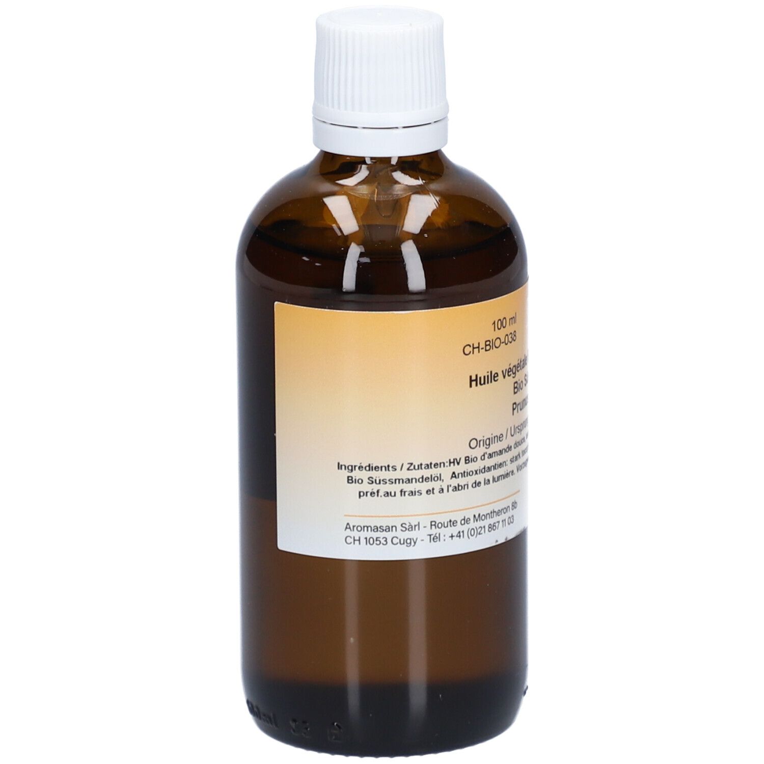 Flacon en verre brun avec bouchon blanc. Étiquette avec informations produit. Huile d'amande douce BIO.