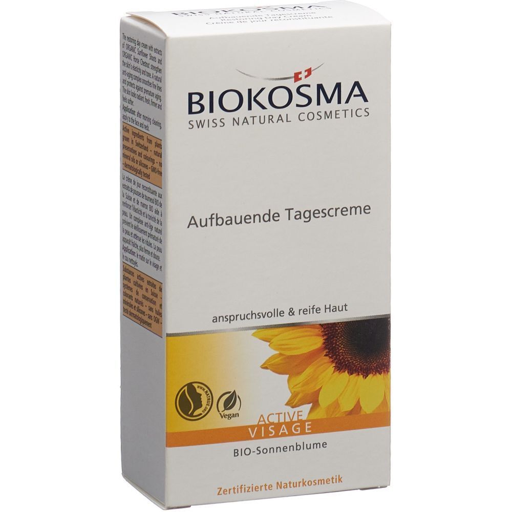 BIOKOSMA Active Tagescreme en boîte. Inscription: Crème de jour reconstituante, peaux exigeantes et matures. Illustration de tournesol.
