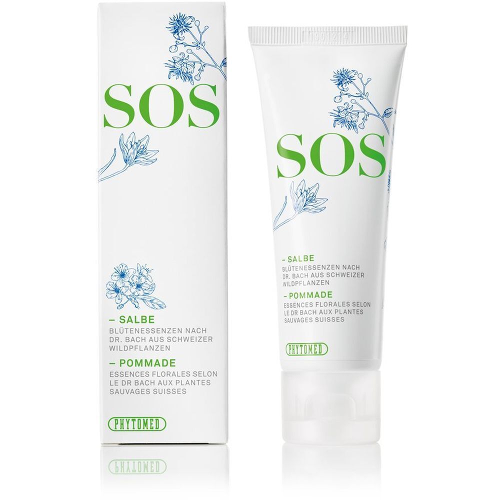 Tube et boîte blanches avec texte vert SOS. Désignation du produit : Pommade/Salbe. Marque : PHYTOMED.