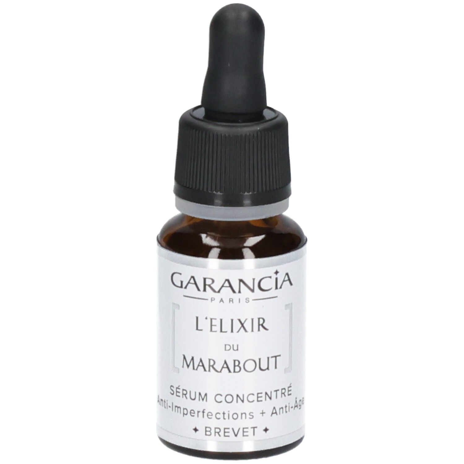 Sérum Garancia L'elixir Du Marabout : flacon en verre brun avec compte-gouttes. Étiquette avec nom du produit et 'Sérum Concentré Anti-Imperfections + Anti-Age'.