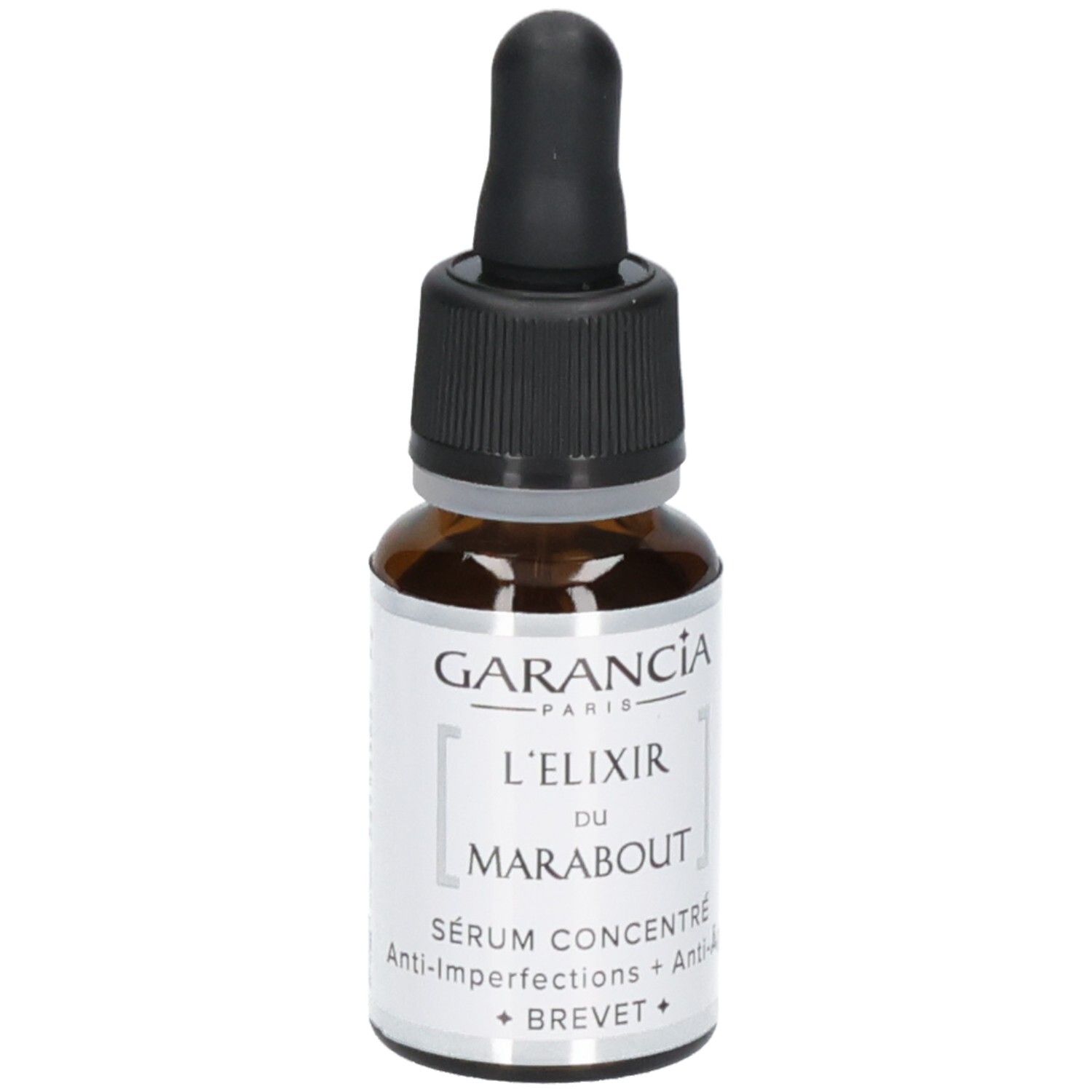 Sérum Garancia L'elixir Du Marabout : flacon en verre brun avec compte-gouttes. Étiquette avec nom du produit et 'Sérum Concentré Anti-Imperfections + Anti-Age'.