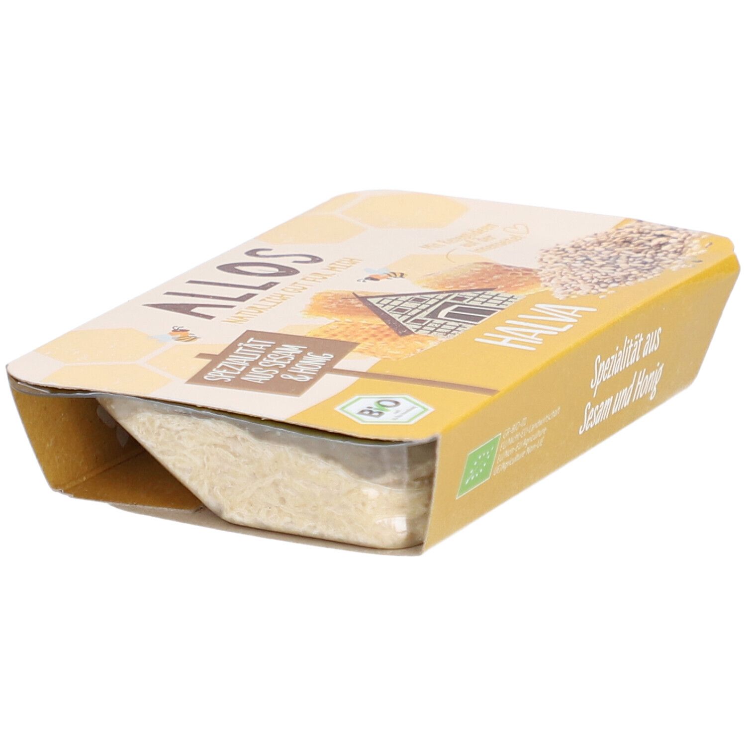 Emballage de halva. Emballage jaune avec l'inscription "Spécialité au sésame et au miel". Label bio.