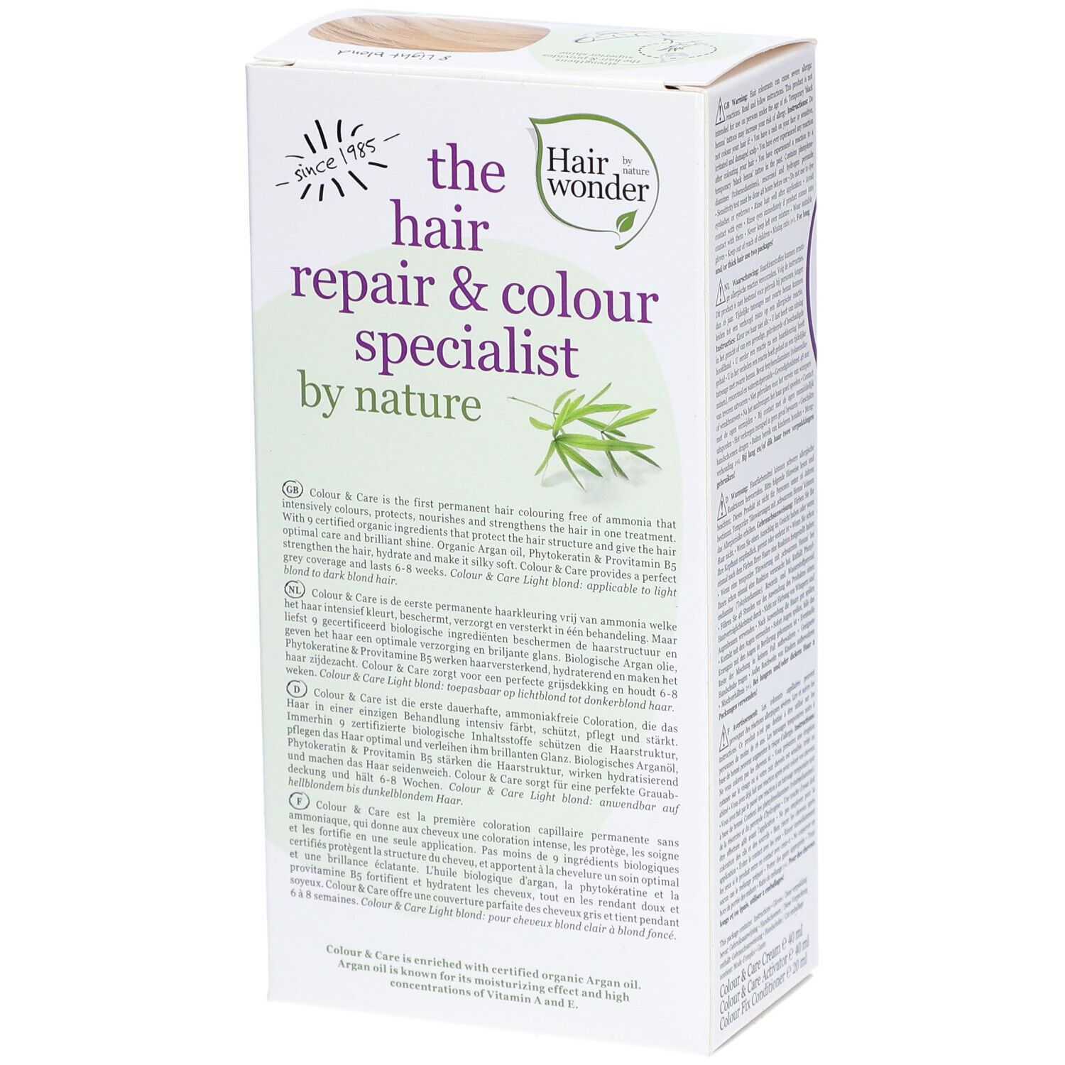 Boîte de coloration capillaire. Inscription : the hair repair & colour specialist by nature. Texte et logo. Vue latérale.